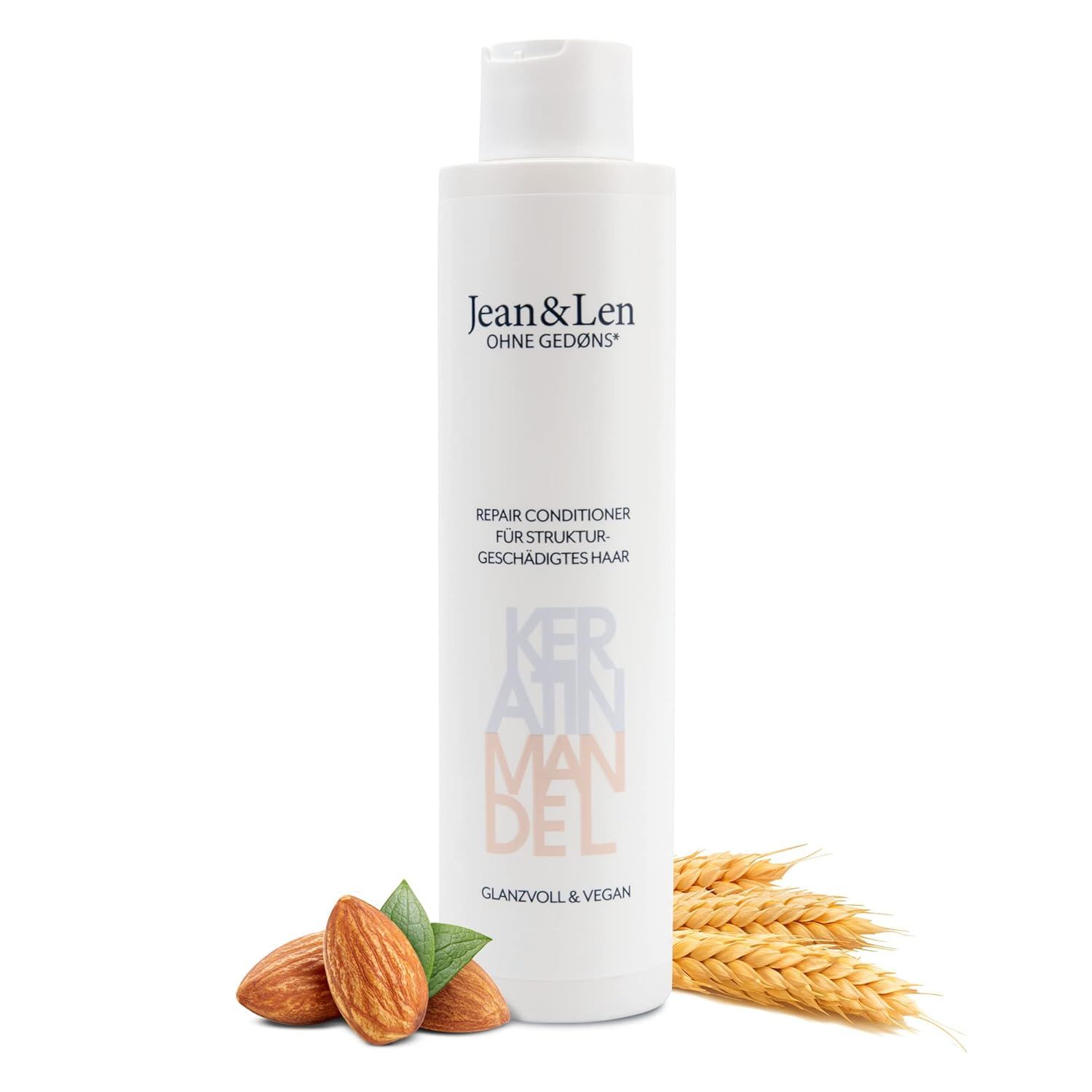 Weiße Flasche Jean & Len Conditioner. Text: Repair Conditioner, Keratin & Mandel, glanzvoll & vegan. Mandeln.