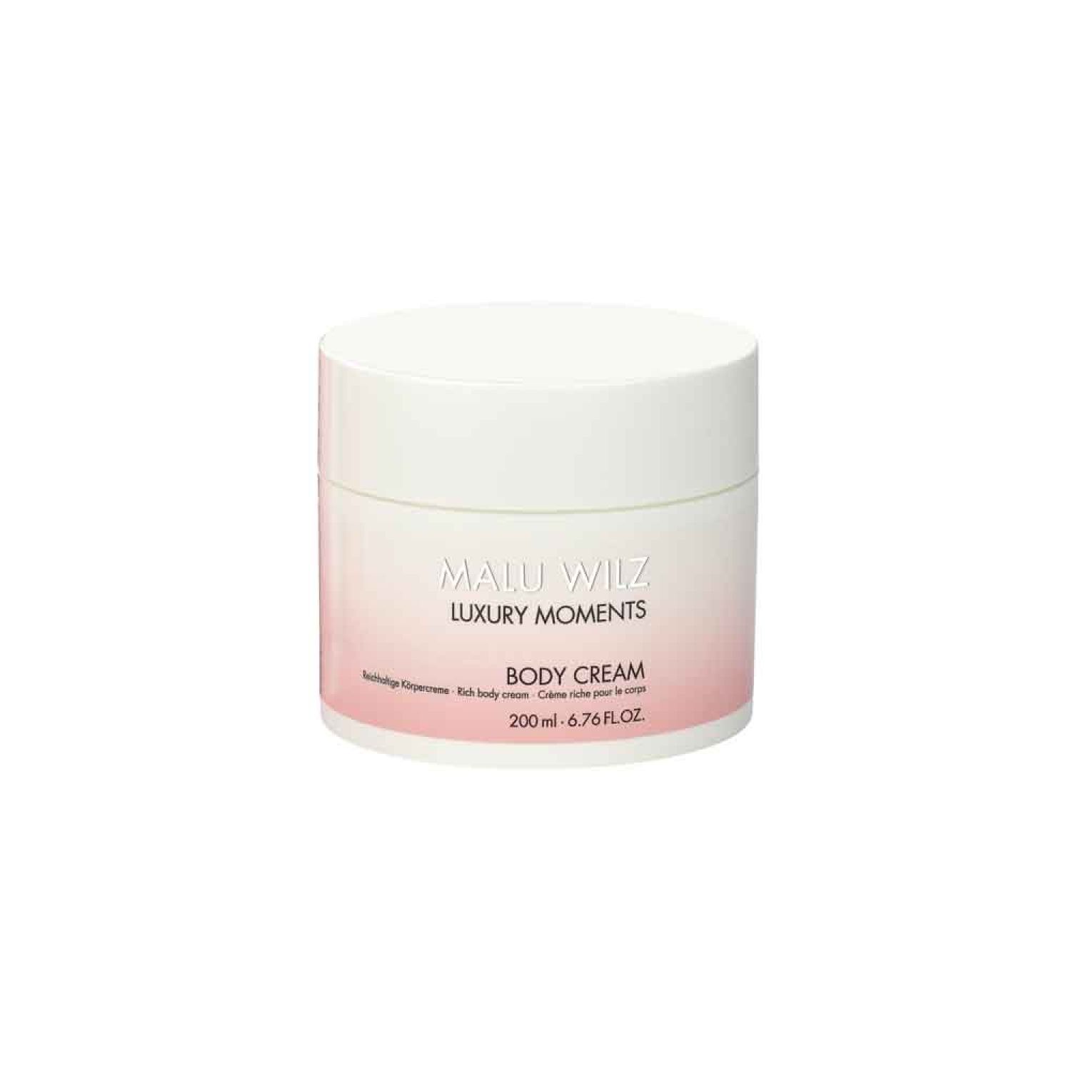 Weißer Tiegel mit rosa Etikett. Aufschrift: Malu Wilz, Luxury Moments, Body Cream. Volumen: 200 ml.