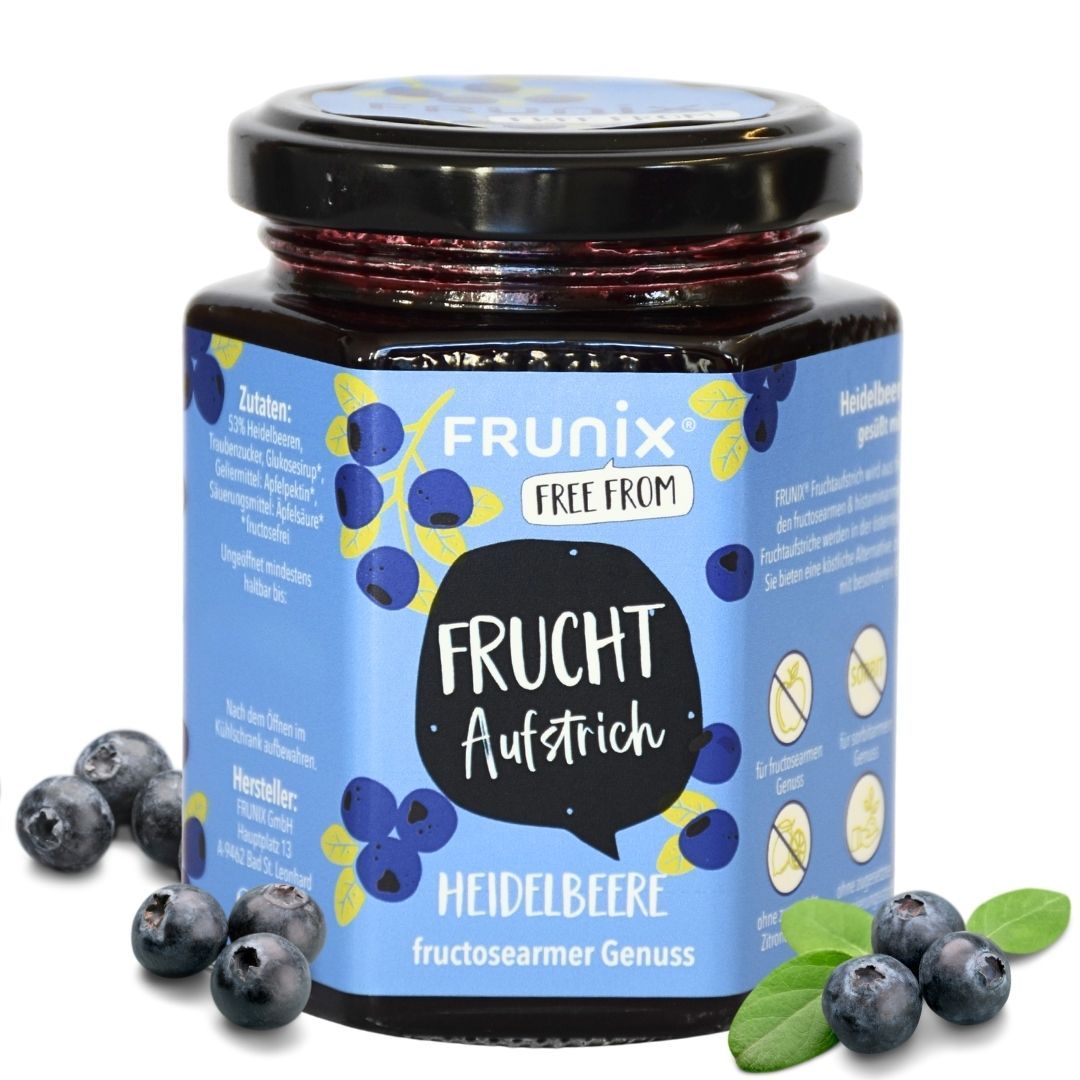 Glas FRUNIX® Heidelbeer-Fruchtaufstrich. Blaues Etikett mit Produktname und Heidelbeeren. Aufschrift: fructosearmer Genuss. Blaubeeren und Blätter daneben.