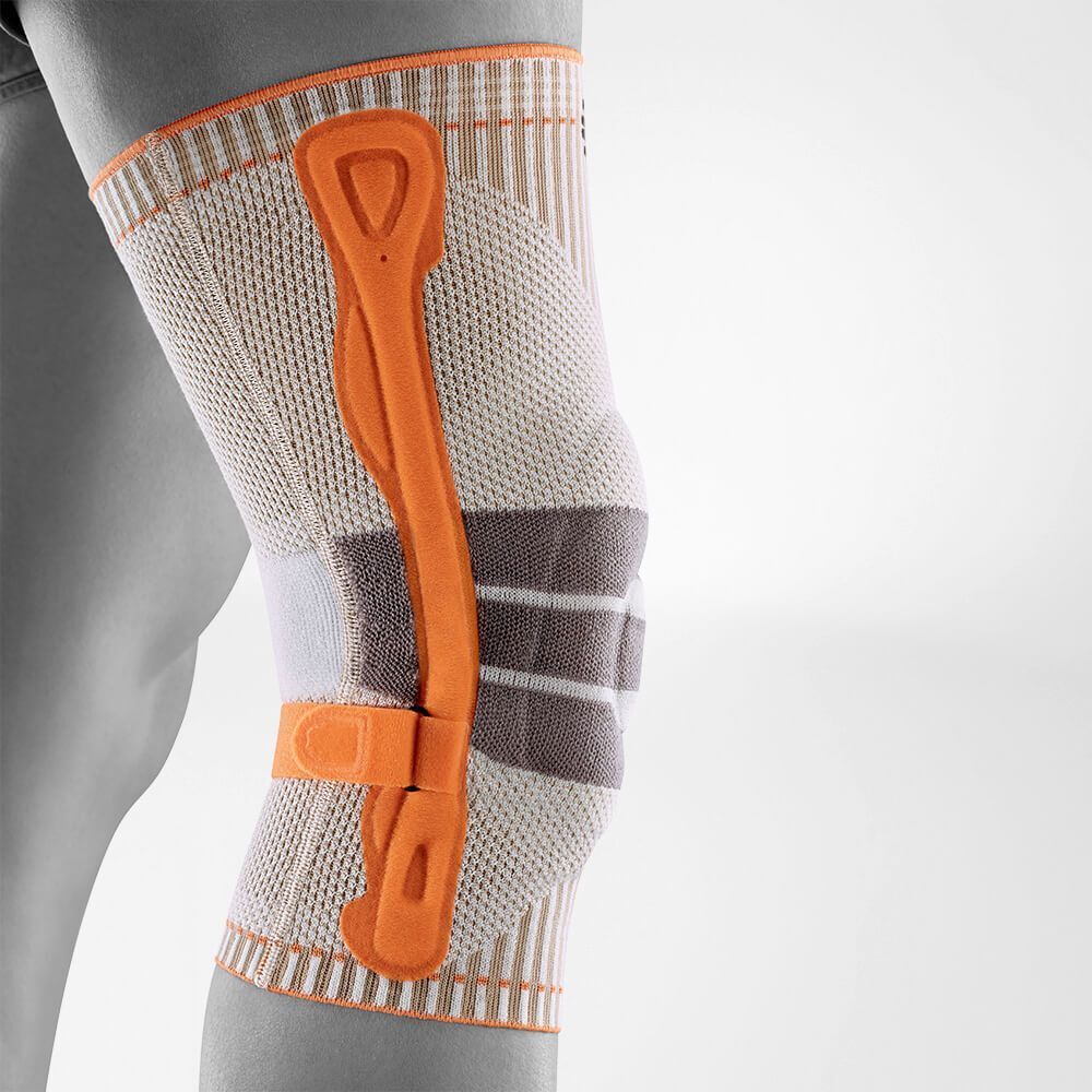 Bauerfeind Kniebandage mit seitlicher Stabilisierung und Pelotte.