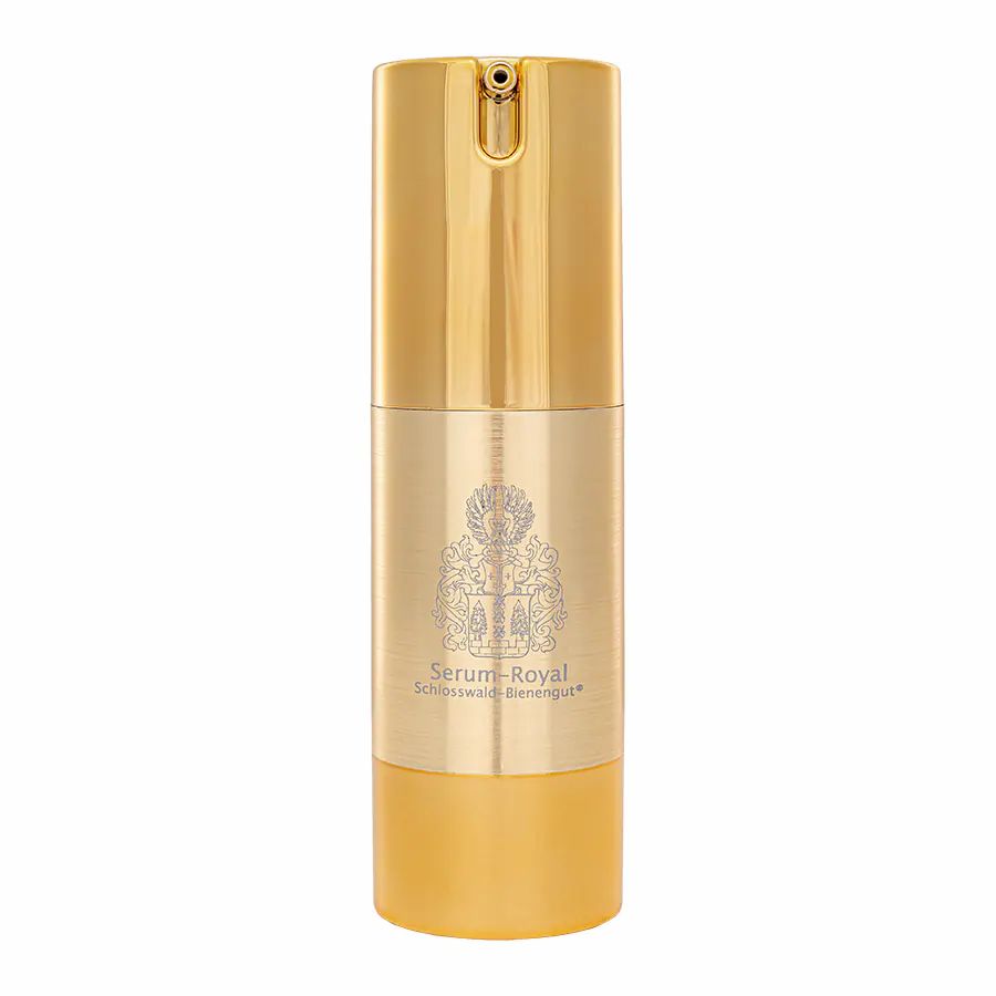 Goldener Pumpspender mit dem Emblem 'Serum-Royal' und 'Schloßwald-Bienengut'.