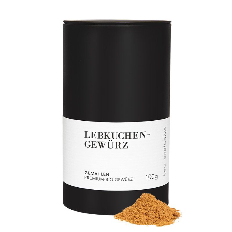 Schwarze Dose mit weißem Etikett, Aufschrift Lebkuchengewürz. Daneben ein Haufen gemahlenes Gewürz. 100g.