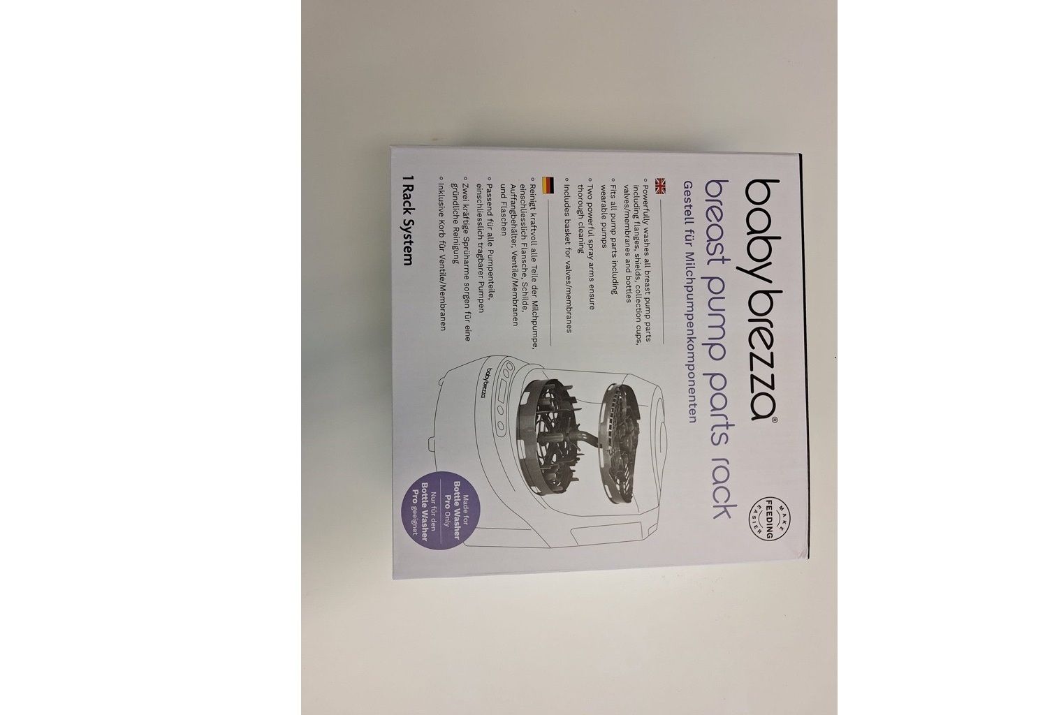 Produktverpackung. Text und Abbildung des Geräts. Produktname: breast pump parts rack. Babybrezza-Logo.
