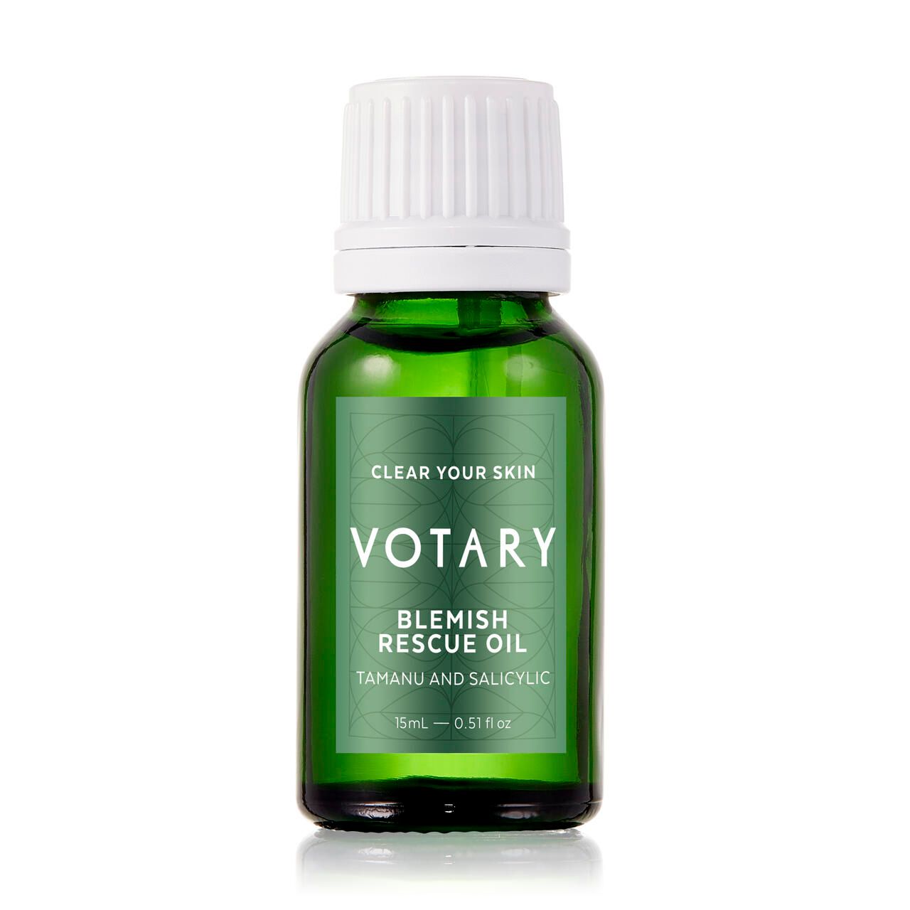 Grüne Glasflasche mit weißem Deckel. Etikett mit "Votary Blemish Rescue Oil".