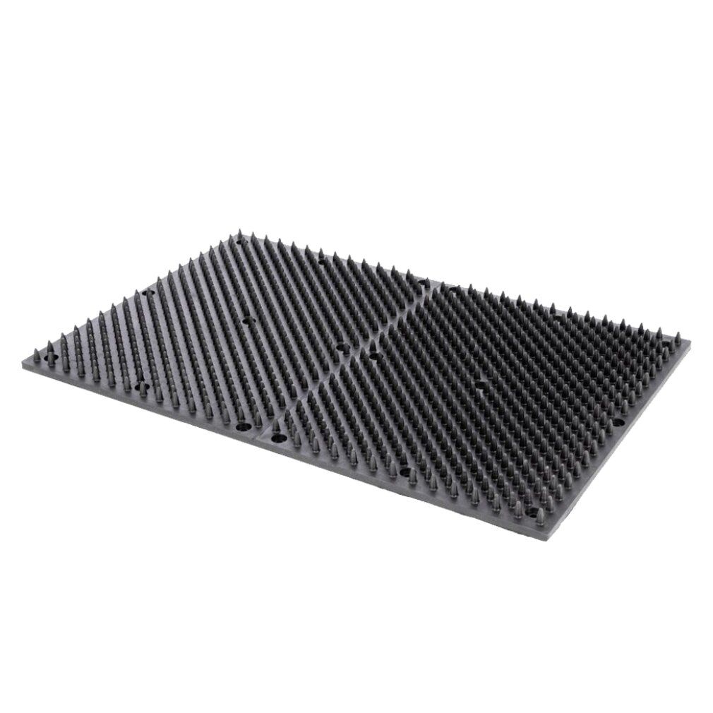 Schwarze Akupressurmatte mit vielen kleinen Spitzen.