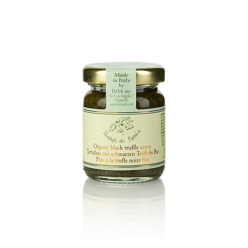 Glas mit schwarzer Trüffelsauce. Aufschrift: Organic black truffle sauce, Tartufata mit schwarzen Trüffeln Bio, Pâte à la truffe noire bio.