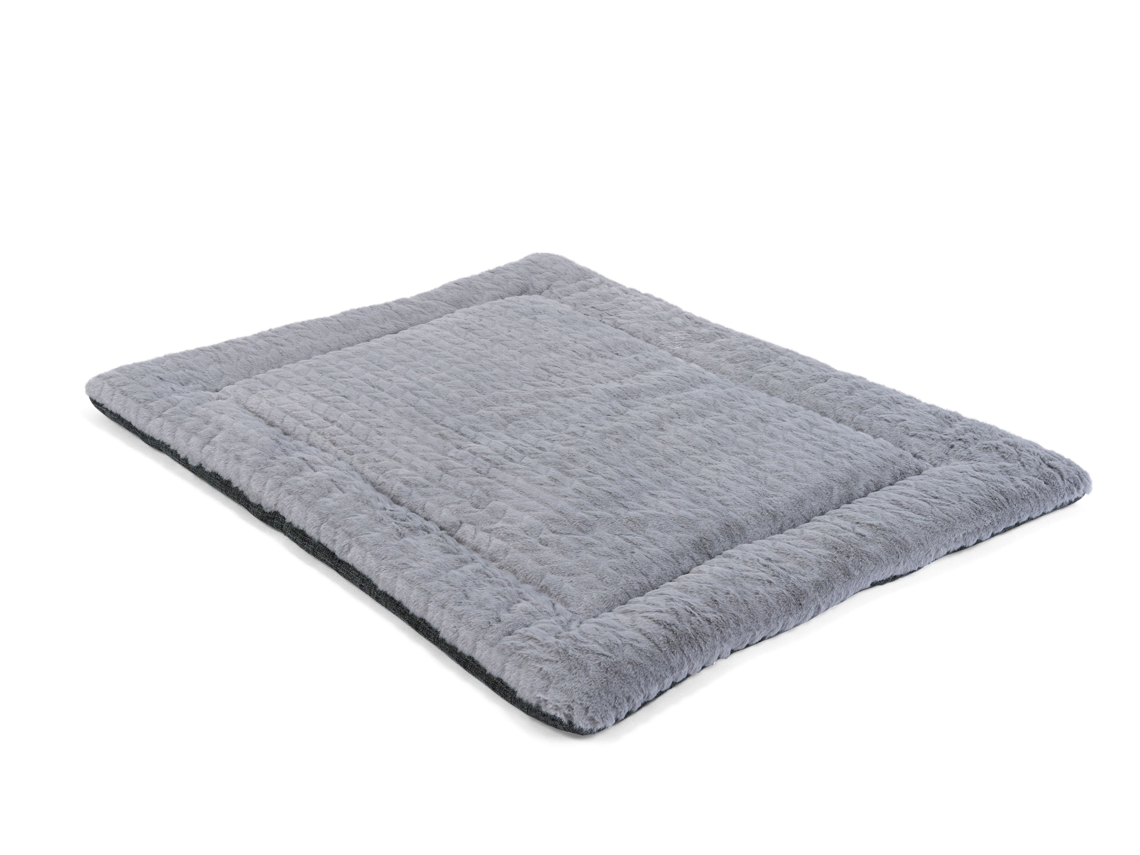 Graue, rechteckige Liegedecke mit schwarzem Rand. Die Oberfläche ist strukturiert.