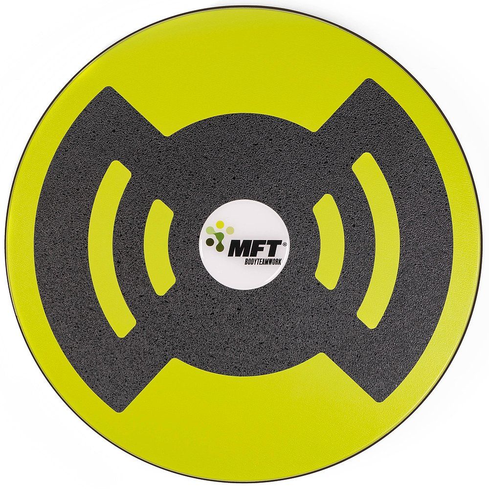 Gelb-schwarze Balance-Disc. Runde Form, Muster auf der Oberseite. Logo MFT. Draufsicht.