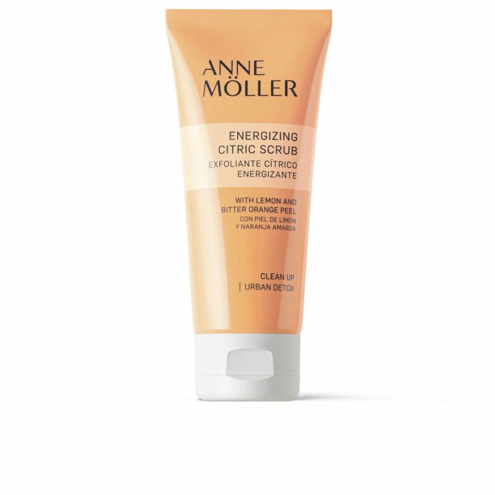 Orange Tube mit weißem Verschluss. Beschriftung: Anne Möller, Energizing Citric Scrub, Exfoliante Cítrico Energizante.
