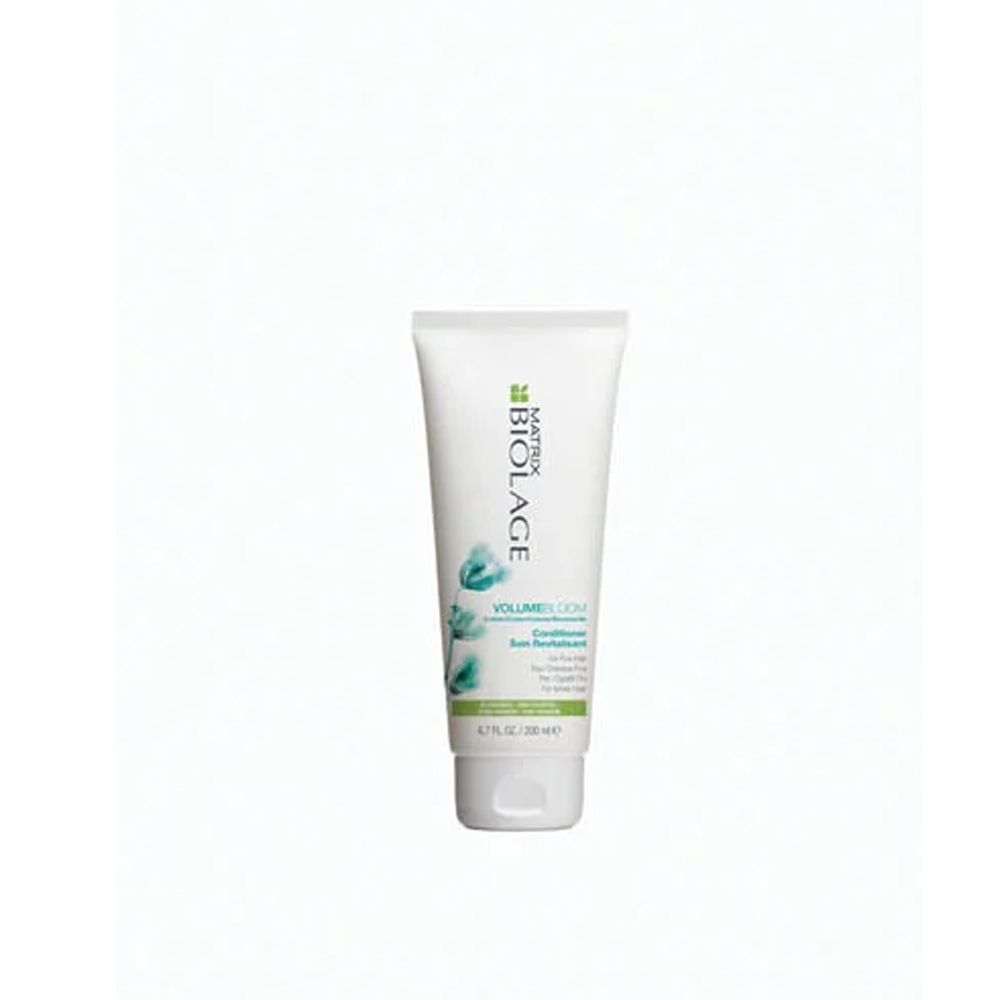 Weißer Tube BIOLAGE volumebloom Conditioner. Grüne und blaue Grafik. Text: Conditioner, 6.7 fl. oz / 200 ml.