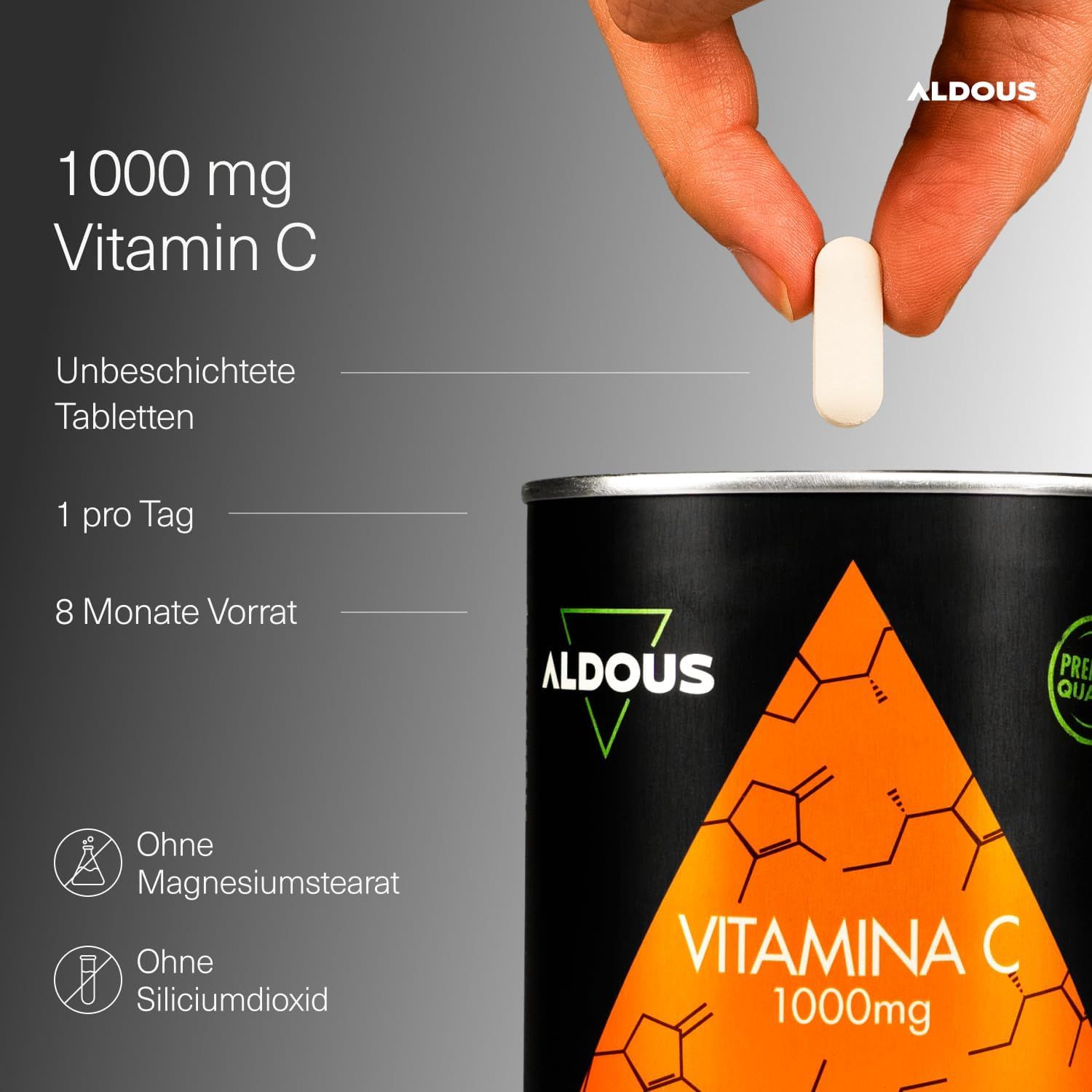 Aldous Vitamin C 1000mg: Unbeschichtete Tablette wird von einer Hand gehalten. Dose im Hintergrund. Informationen zu Dosierung und Inhaltsstoffen.