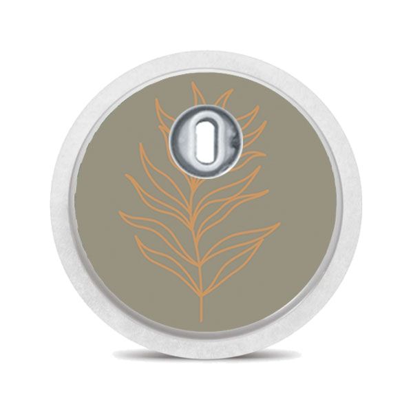 Runder Aufkleber mit Blattmuster. Beige Hintergrund, orangefarbenes Blatt. Für FreeStyle Libre 3.