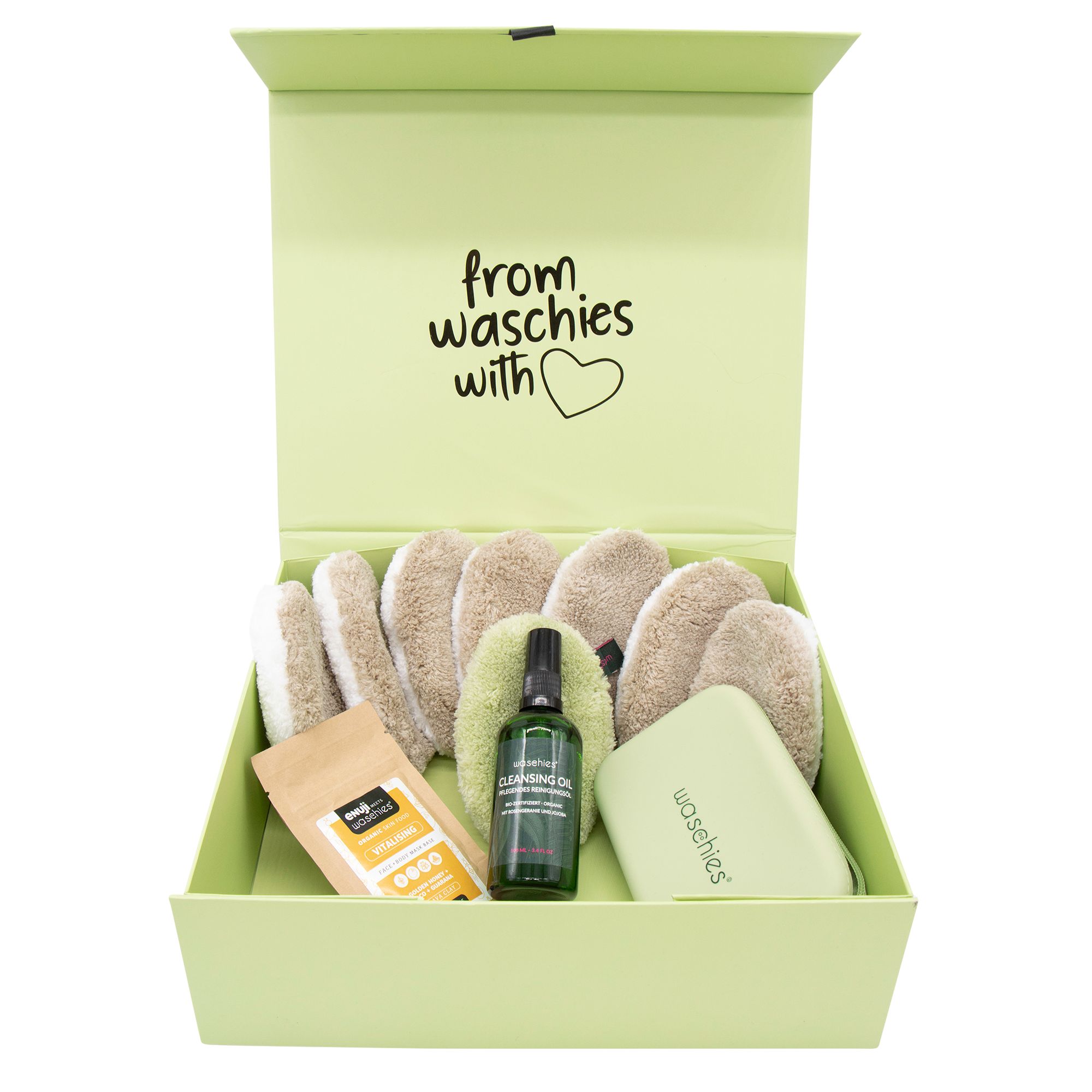 Grüne Box mit Produkten. Enthält Waschpads, Reinigungsöl, eine Tasche und ein Päckchen. Aufschrift: from waschies with ❤️.