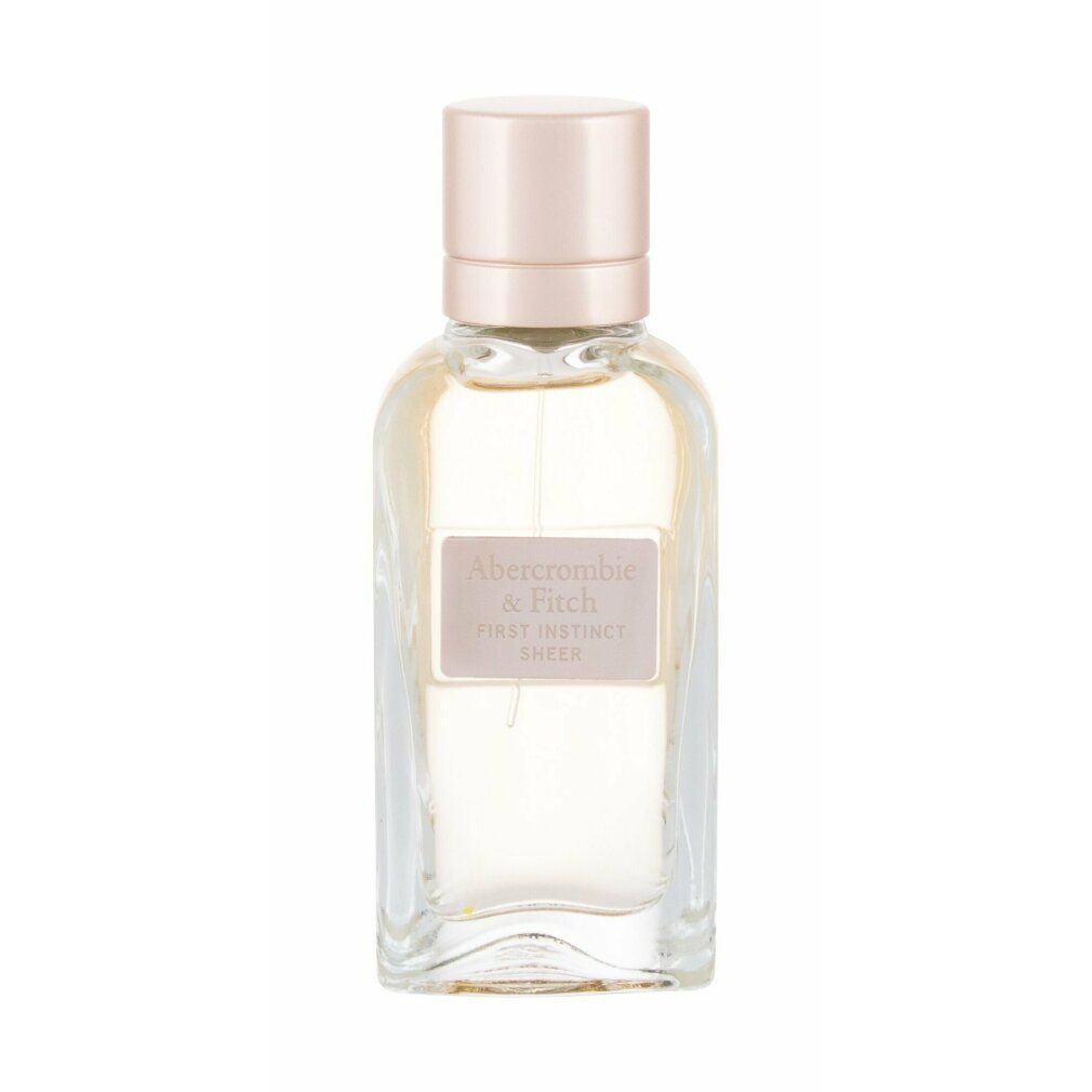Parfümflasche mit rosafarbenem Verschluss. Auf dem Etikett steht "Abercrombie & Fitch First Instinct Sheer".