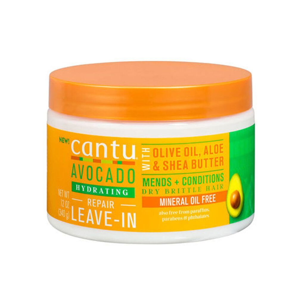 Cantu Avocado Hydrating Repair Leave-In. Weiße Dose mit orangefarbenem Deckel. Gelbes Etikett mit grünen und weißen Akzenten. Avocado-Illustration.