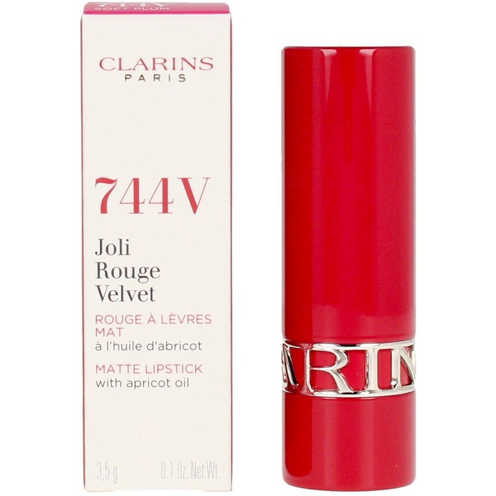 Roter Lippenstift und Schachtel. Auf der Schachtel: "Clarins Paris", "744V", "Joli Rouge Velvet".
