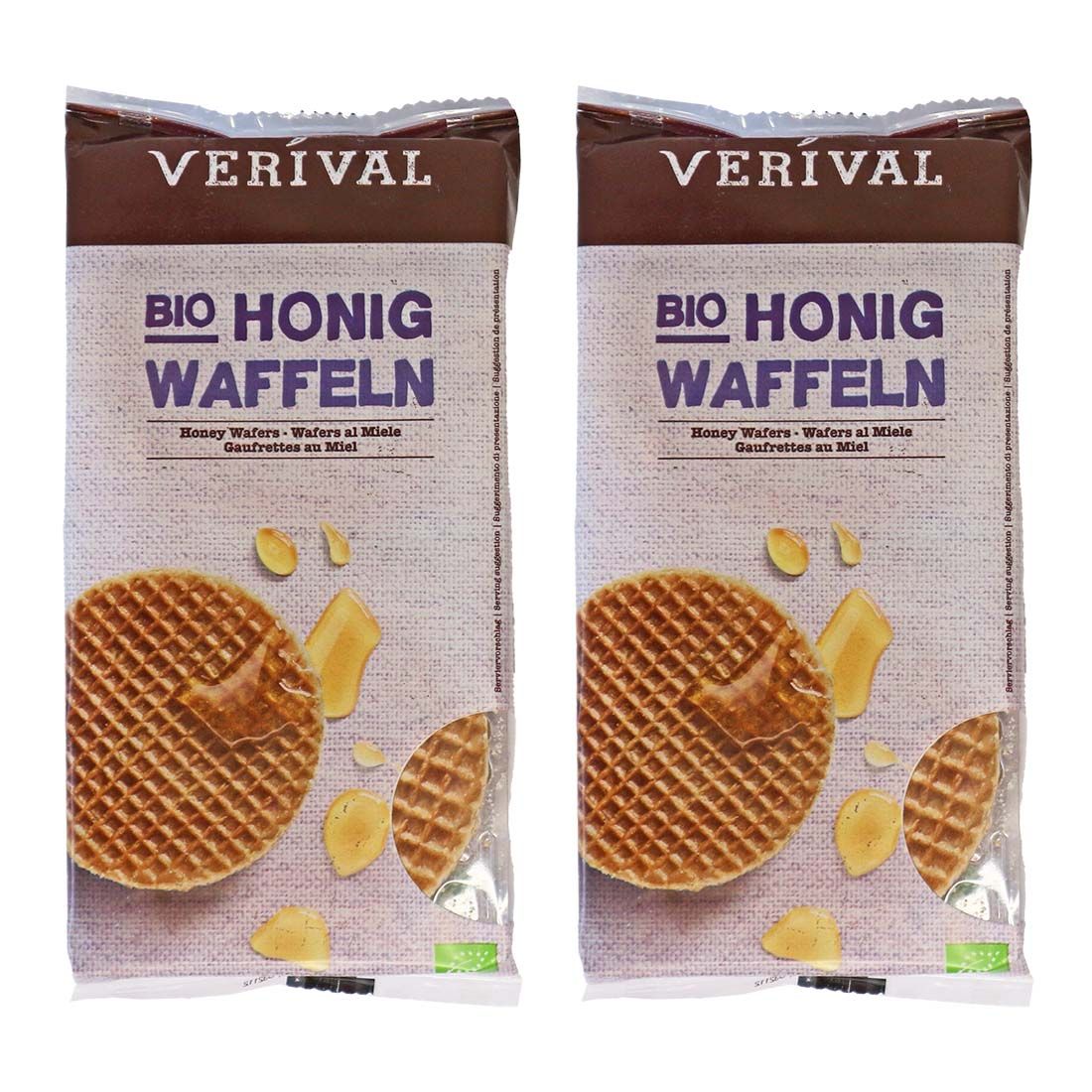 Zwei Packungen Honigwaffeln Bio. Aufschrift 'BIO HONIG WAFFELN' und 'Honig Wafers'. Braune Verpackung mit Abbildung der Waffeln.