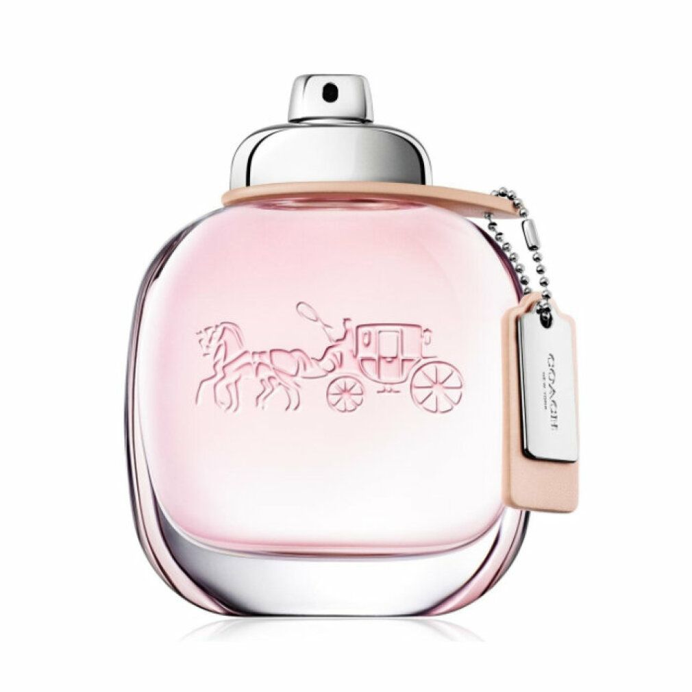 Rosa Eau de Toilette Flakon. Logo und Schriftzug COACH. Anhänger mit Logo. Glasflakon. Hellrosa Flüssigkeit.