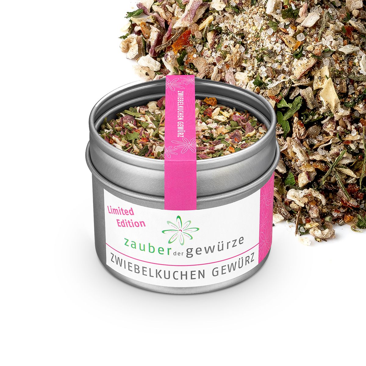 Dose mit Gewürzmischung, rosa Etikett mit 'Zauber der Gewürze Zwiebelkuchen Gewürz' und 'Limited Edition'. Gewürze daneben.