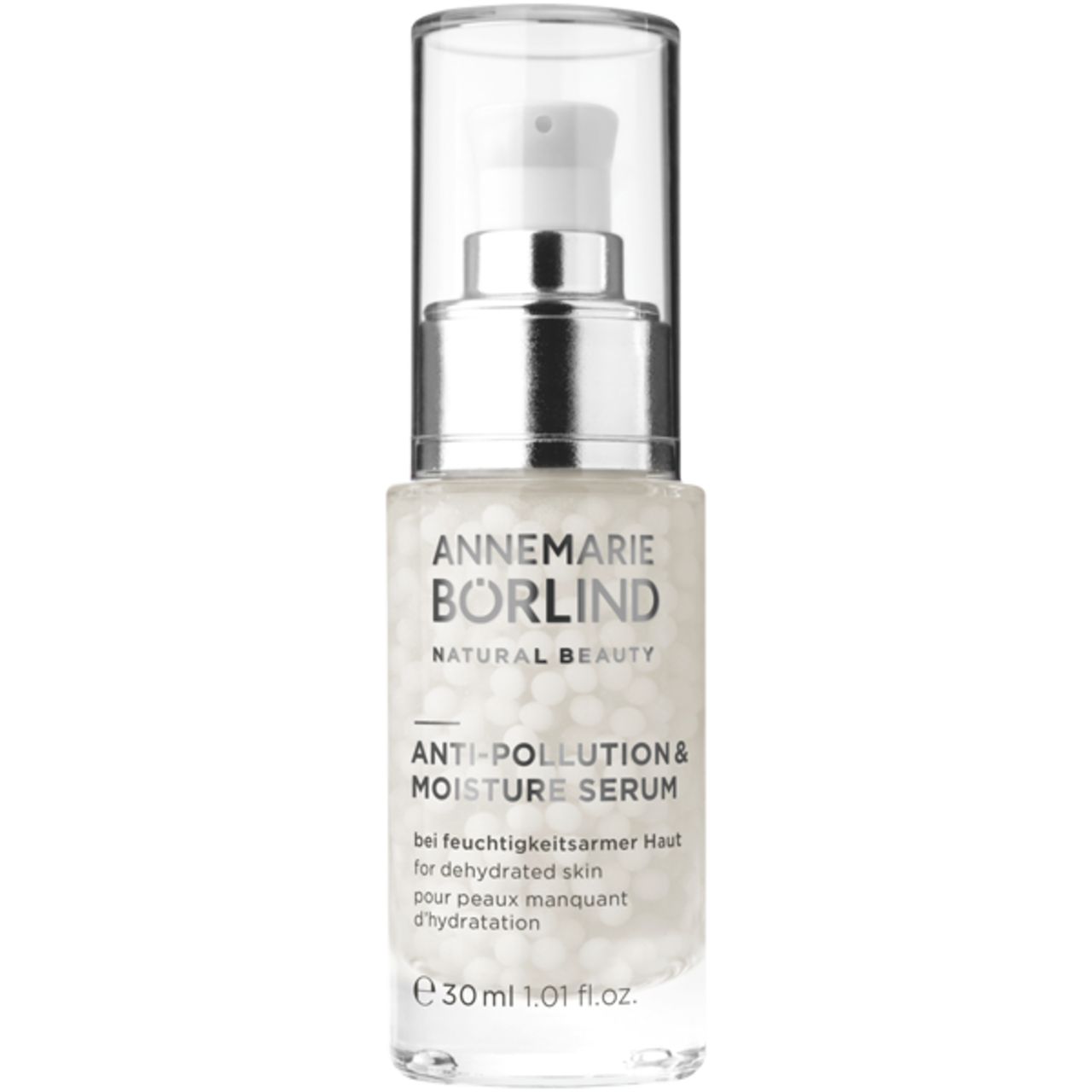 Serumflasche mit silbernem Pumpkopf. Text: ANNEMARIE BÖRLIND, ANTI-POLLUTION & MOISTURE SERUM. Für trockene Haut.