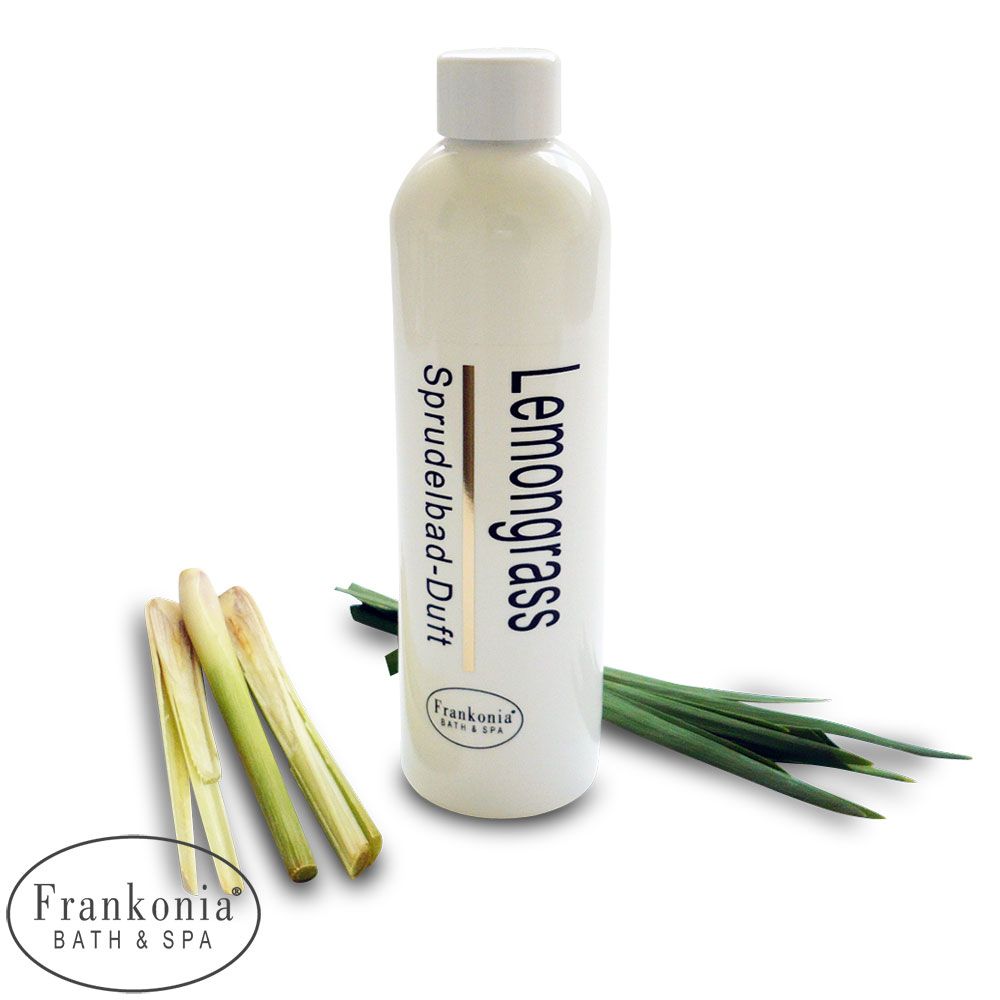 Flacon blanc de Frankonia Bath & Spa Bain Moussant Concentré de Parfum Citronnelle 2. L'étiquette indique "Lemongrass" et "Sprudelbad-Duft". Des tiges et des feuilles de citronnelle sont disposées à côté.