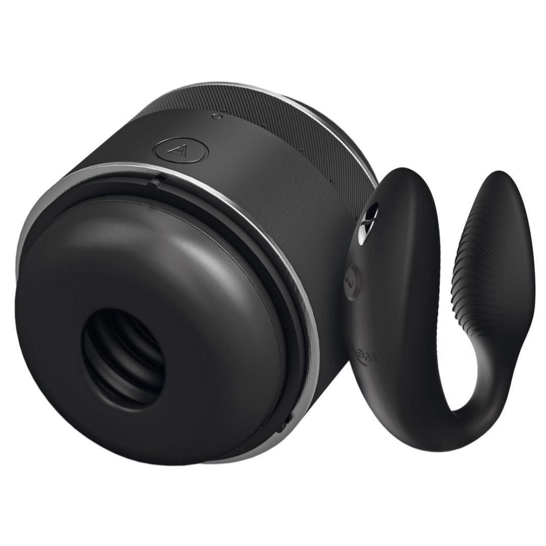Schwarzes Sextoy-Set. Enthält ein zylindrisches Gerät und ein U-förmiges Gerät. Das zylindrische Gerät hat eine Öffnung und eine silberne Umrandung.
