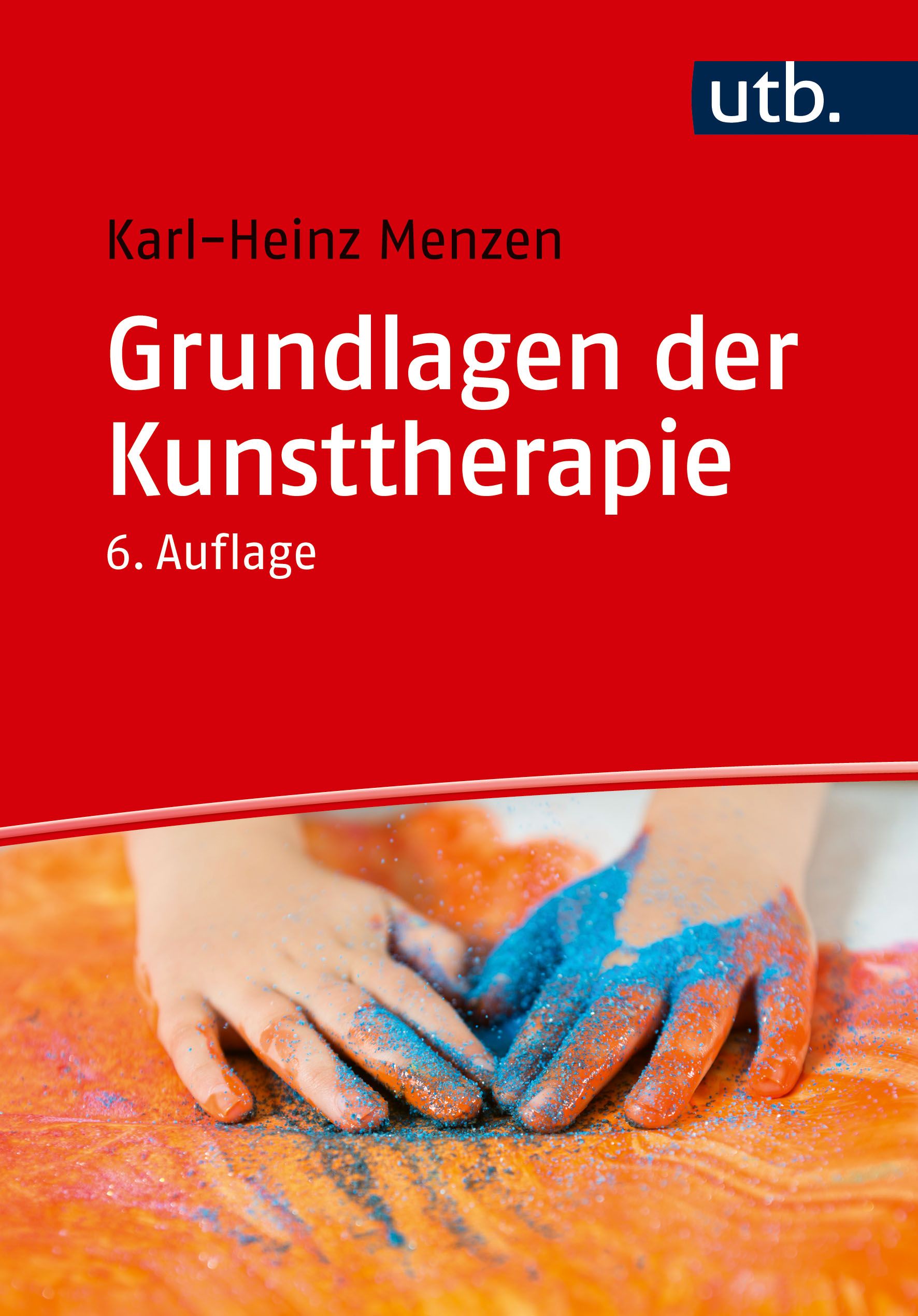 Buchcover: "Grundlagen der Kunsttherapie" von Karl-Heinz Menzen. 6. Auflage. Hände mit farbigem Puder.