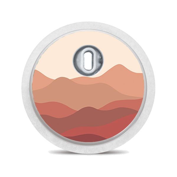 Runder Aufkleber mit Berglandschaft. Beige, braune Farbtöne. Für medizinische Geräte.
