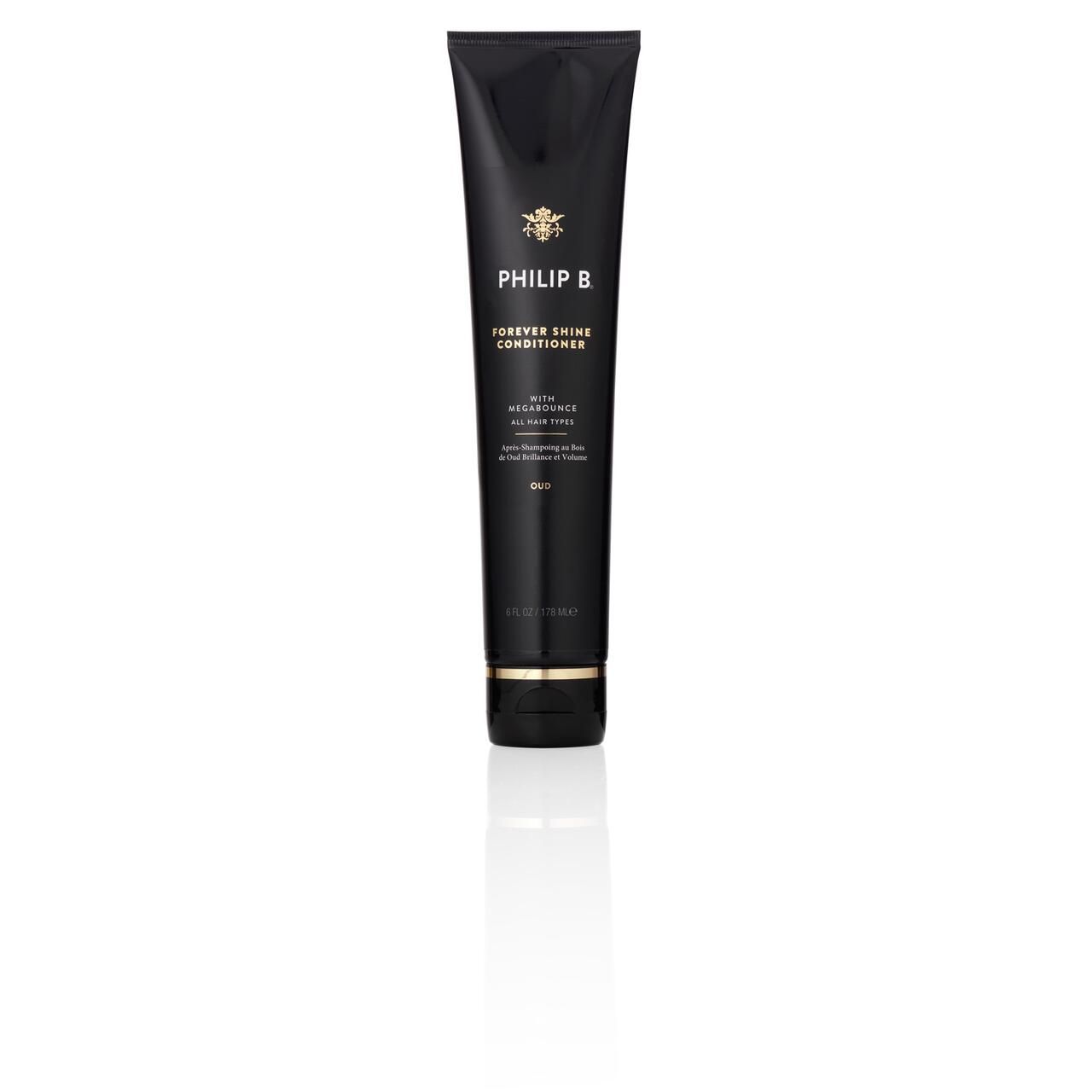 Schwarze Tube Philip B Forever Shine Conditioner. Goldfarbene Schrift. Aufschrift: "Oud".