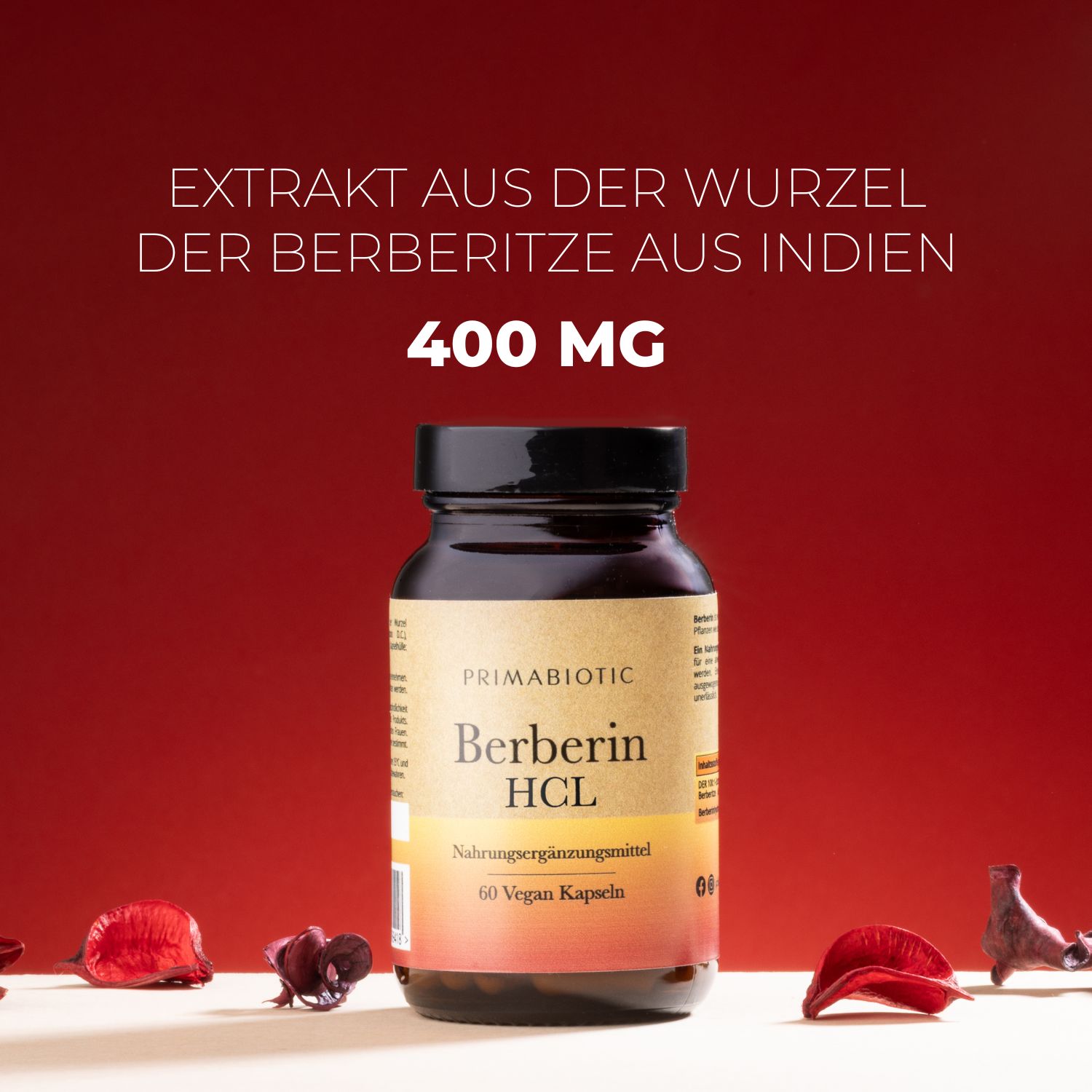Braune Flasche mit schwarzem Deckel. Aufschrift "PRIMABIOTIC", "Berberin HCL", "400 MG". Roter Hintergrund.