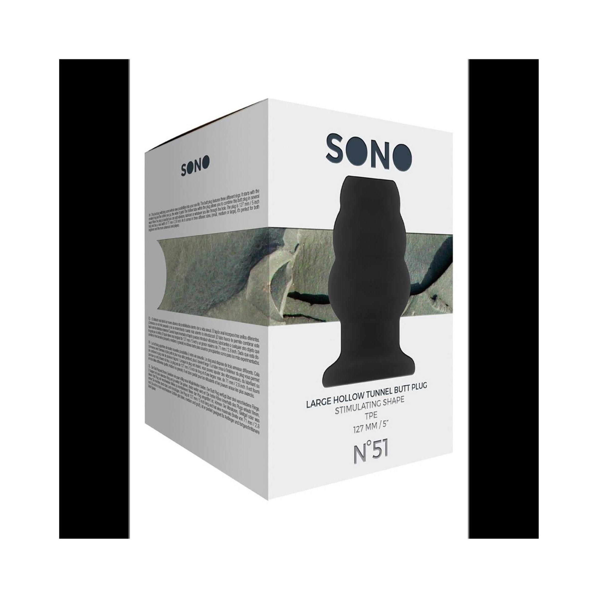 Verpackung mit Produktabbildung. Schwarzer Butt Plug, Bezeichnung: Sono, N°51, LARGE HOLLOW TUNNEL BUTT PLUG STIMULATING SHAPE, 127 MM/5".