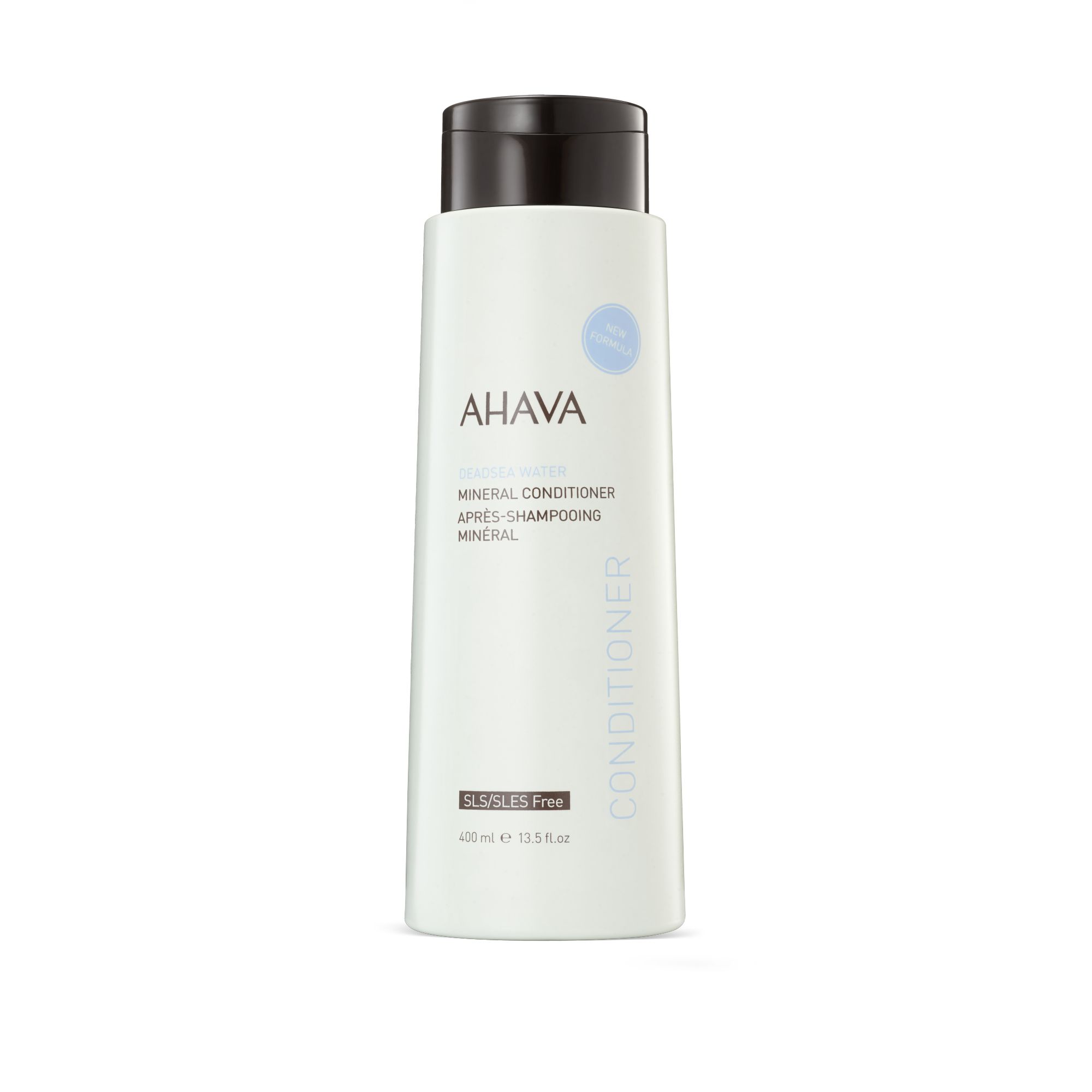AHAVA Mineral Conditioner Flasche. Weiß, mit schwarzem Deckel. Beschriftung: AHAVA, Mineral Conditioner, SLS/SLES Free.