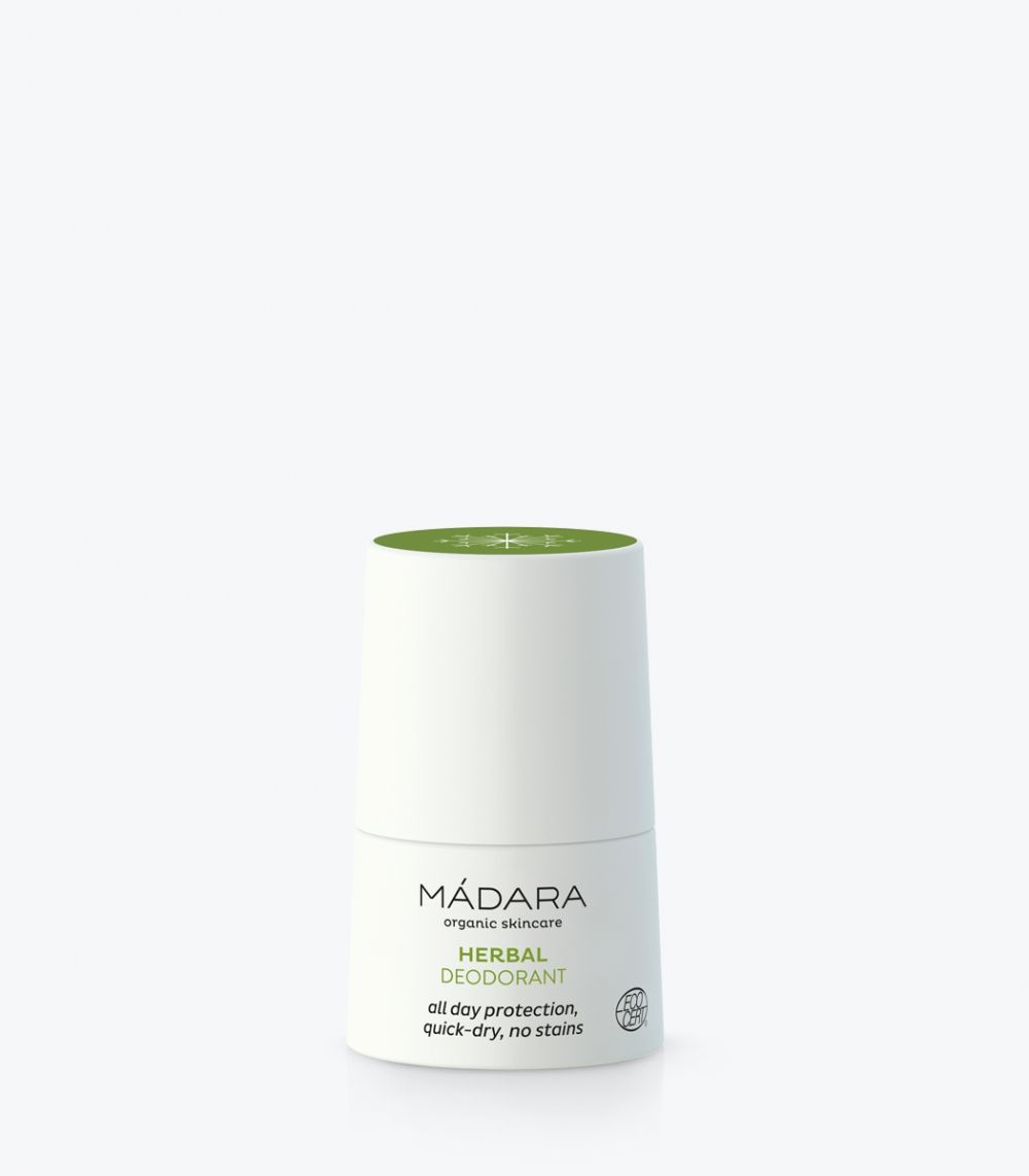 Weißer Roll-on-Deo mit grünem Deckel. Aufschrift: MÁDARA, Herbal Deodorant, all day protection, quick-dry, no stains. Bio-Siegel.