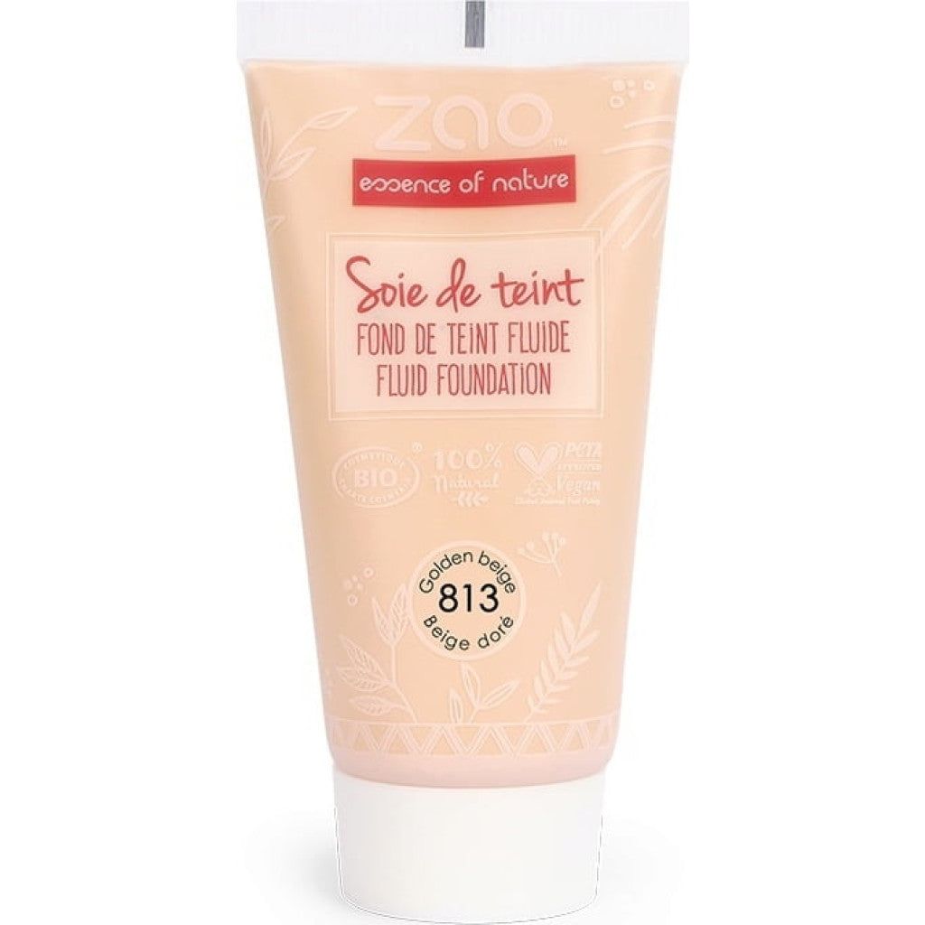 Beige Tube mit Aufschrift "ZAO essence of nature". Text: "Soie de teint, Fond de teint fluide, Fluid foundation". Farbton: 813 Golden beige.