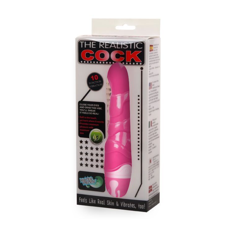 Verpackung mit pinkfarbenem Vibrator. Text: THE REALISTIC COCK, 10 Funktionen. Enthält Produktabbildung.