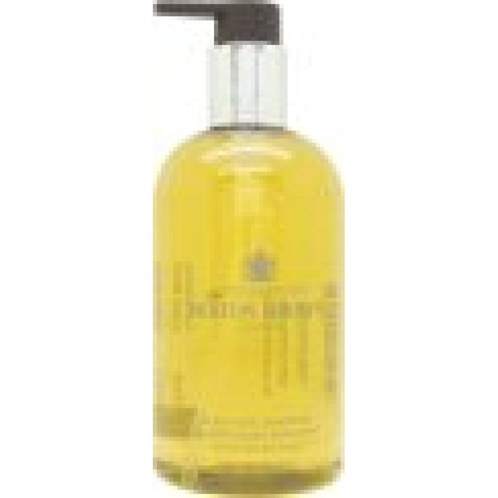 Molton Brown Shampoo-Flasche mit Pumpspender, gelb, mit silbernem Pumpkopf.