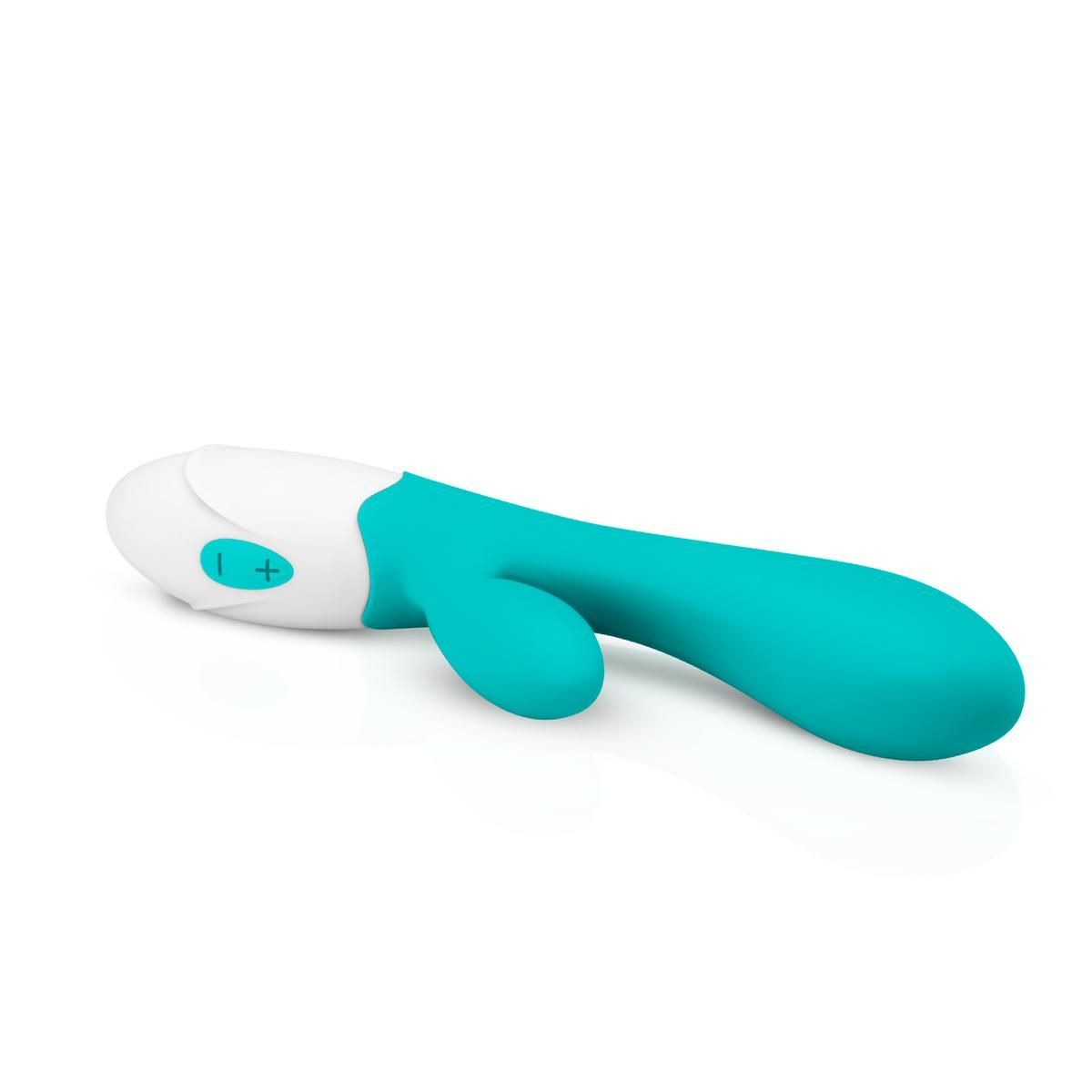 Vibrateur turquoise et blanc. Forme ergonomique avec deux éléments de stimulation. Base blanche avec boutons de commande.