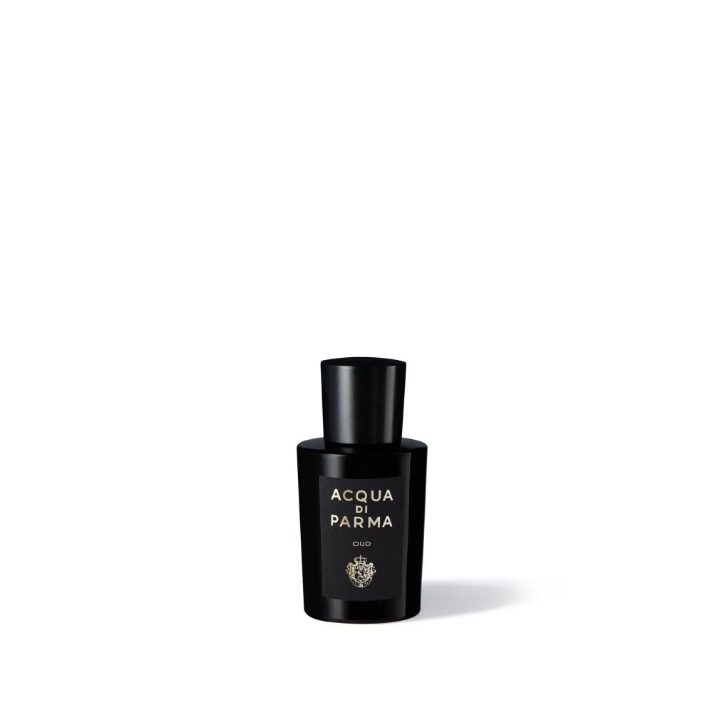 Schwarze Flasche mit Aufschrift ACQUA DI PARMA OUD. Schwarzer Deckel. Goldene Schrift.