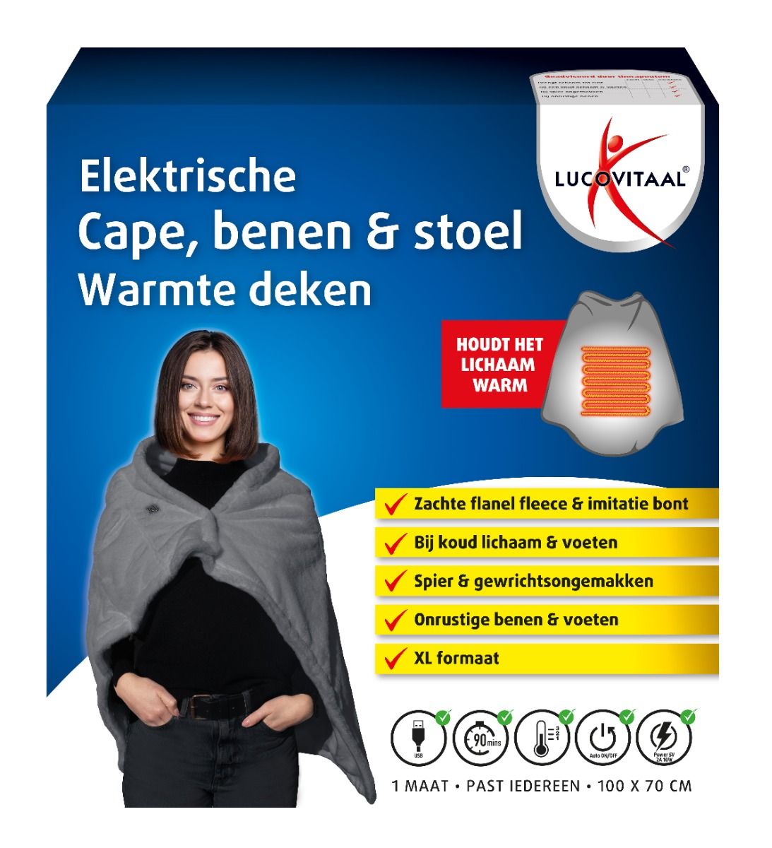 Grijze elektrische deken, cape, benen & stoel. Vrouw draagt hem. Logo Lucovitaal. Tekst: Zachte flanel fleece & imitatie bont. XL formaat.
