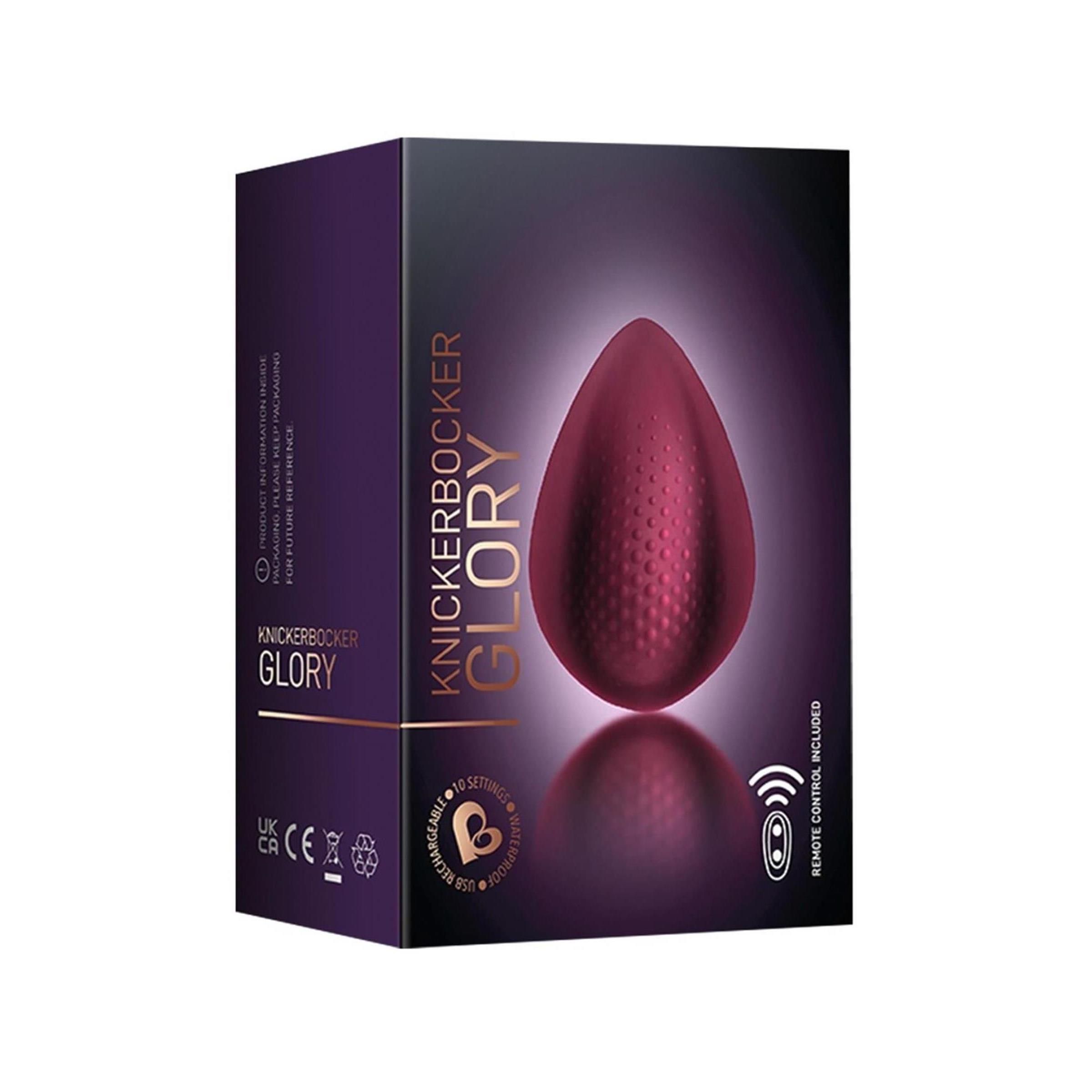 Verpackung mit Produkt. Aufschrift: Knickerbocker Glory. Ei-förmiges Produkt, dunkelrot. Fernbedienung enthalten.