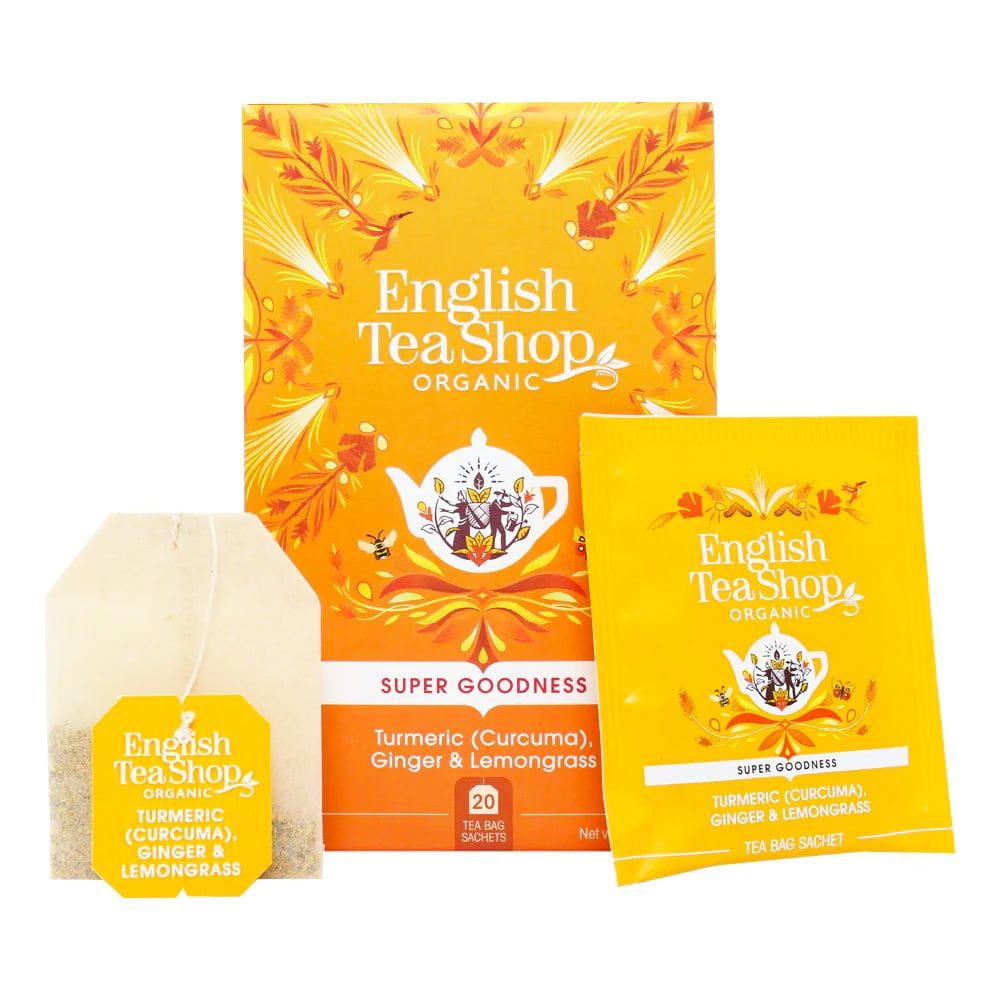 Theebox, Teebeutel und Teebeutel-Verpackung. Aufschrift: Kurkuma, Ingwer & Zitronengras. English Tea Shop Organic.