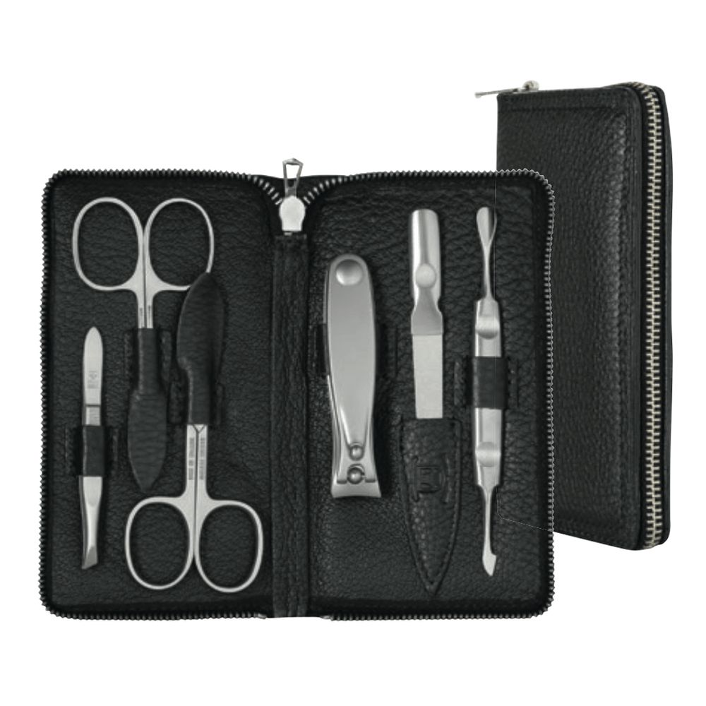 Schwarzes Lederetui mit 6 Maniküre- und Pediküre-Instrumenten aus Metall.