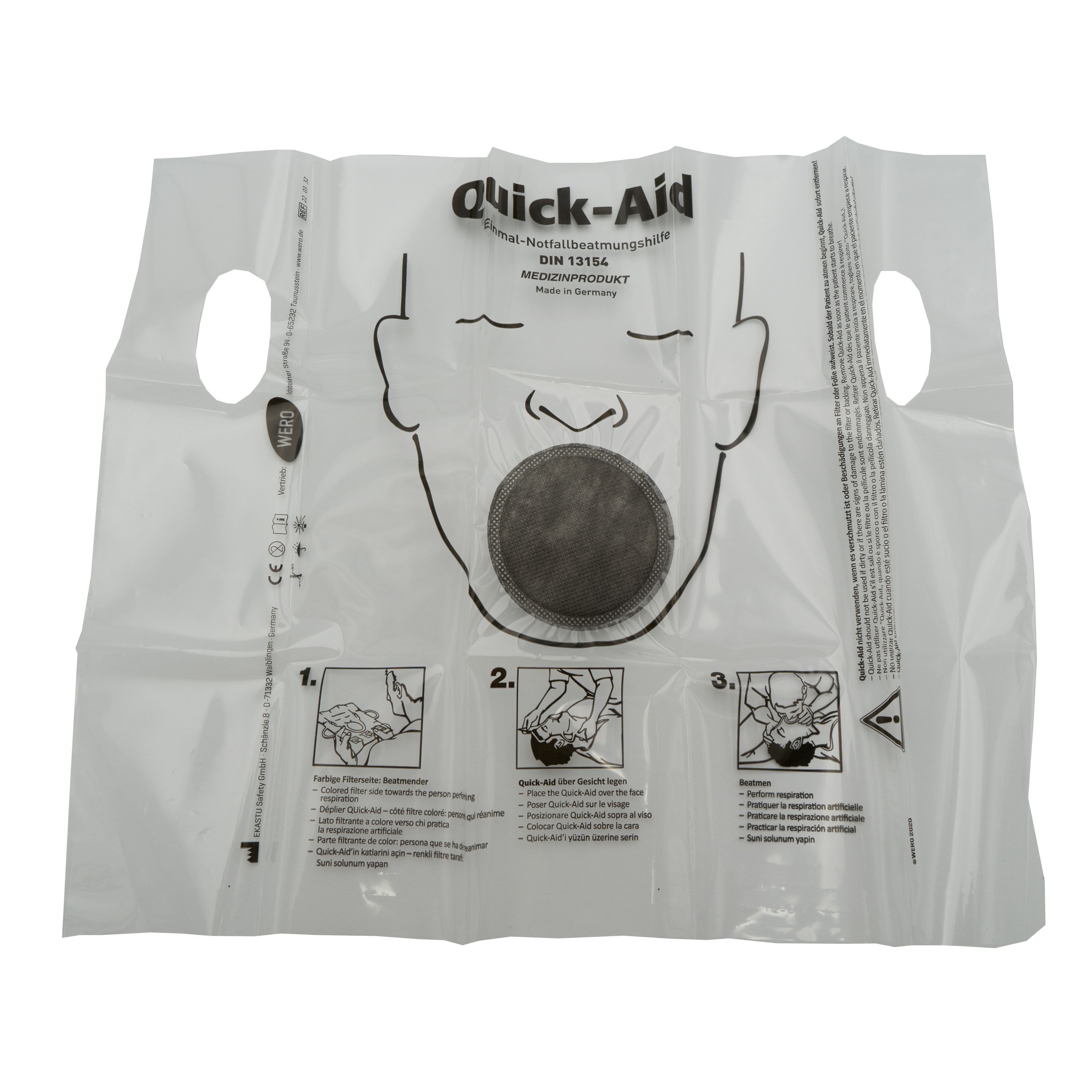 Notfallbeatmungshilfe ausgebreitet. Aufdruck: Quick-Aid, DIN 13154. Mit Filter und Anleitung.
