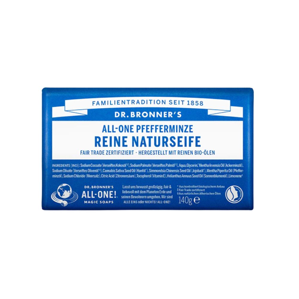 Rechteckige Seife mit blauer Verpackung. Aufschrift: DR. BRONNER'S, ALL-ONE PFEFFERMINZE, REINE NATURSEIFE. Fair Trade zertifiziert. 140g.
