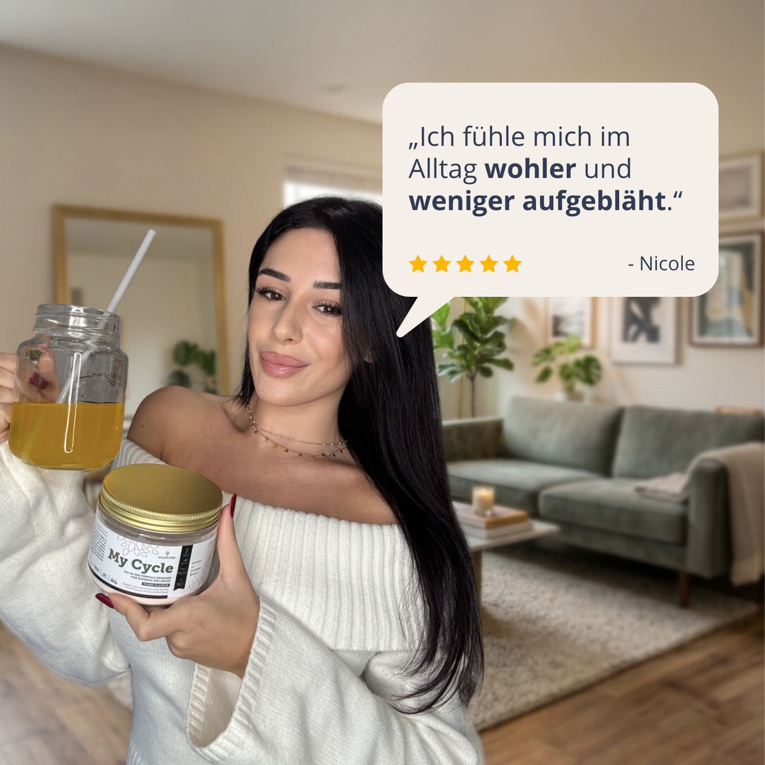 Frau mit Golden Tree My Cycle Mango Pulver und einem Getränk, mit positivem Kundenfeedback.