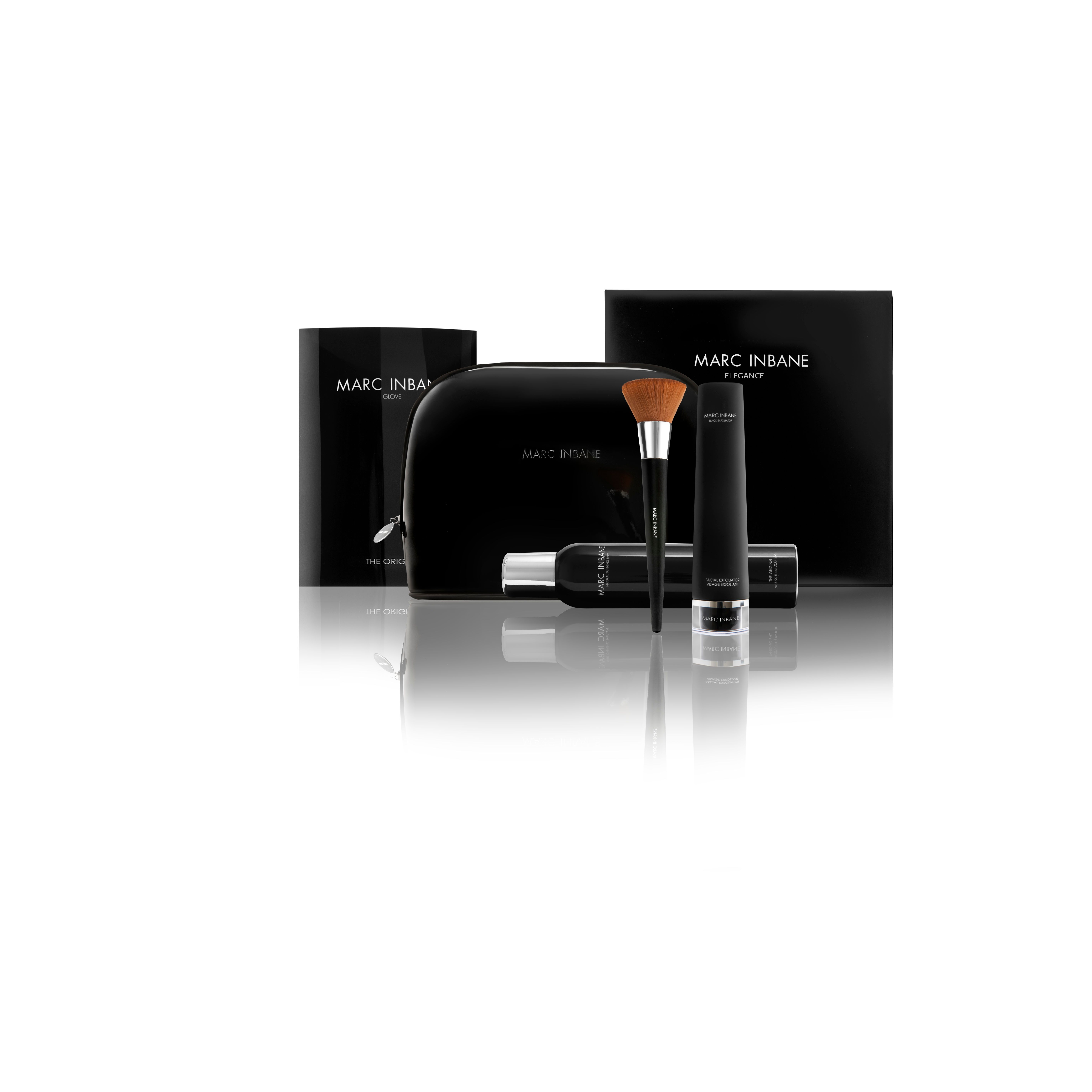 Schwarzes Set mit Kosmetiktasche, Pinsel, Flaschen und Verpackung. Aufschrift: MARC INBANE.