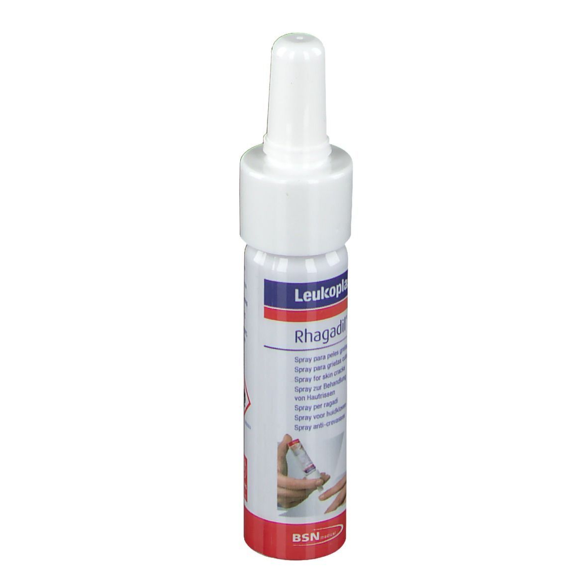 Leukoplast Rhagadil Spray. Weiße Flasche mit rotem Boden. Text und Warnhinweise auf dem Etikett.
