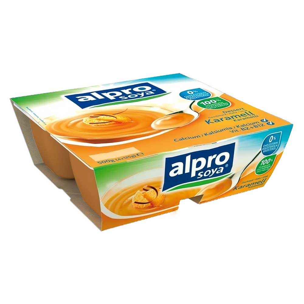 Alpro Soya Dessert Karamell in Viererpackung. Orangefarbene Verpackung mit Produktabbildung. Schriftzug Alpro Soya und Dessert Karamell.