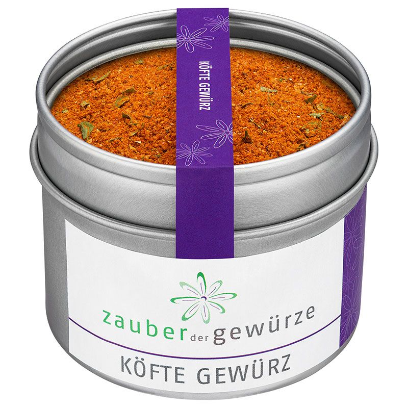 Runde Dose mit Köfte Gewürz. Aufschrift: Zauber der Gewürze, Köfte Gewürz. Lila Band mit Aufschrift.