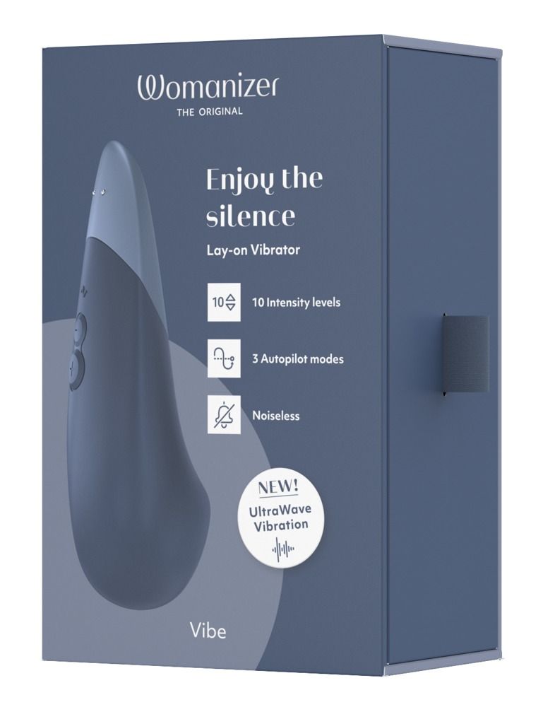 Dunkelblaue Verpackung mit Produktabbildung. Text: Womanizer, Enjoy the silence, Lay-on Vibrator, 10 Intensitätsstufen, 3 Modi, geräuschlos.